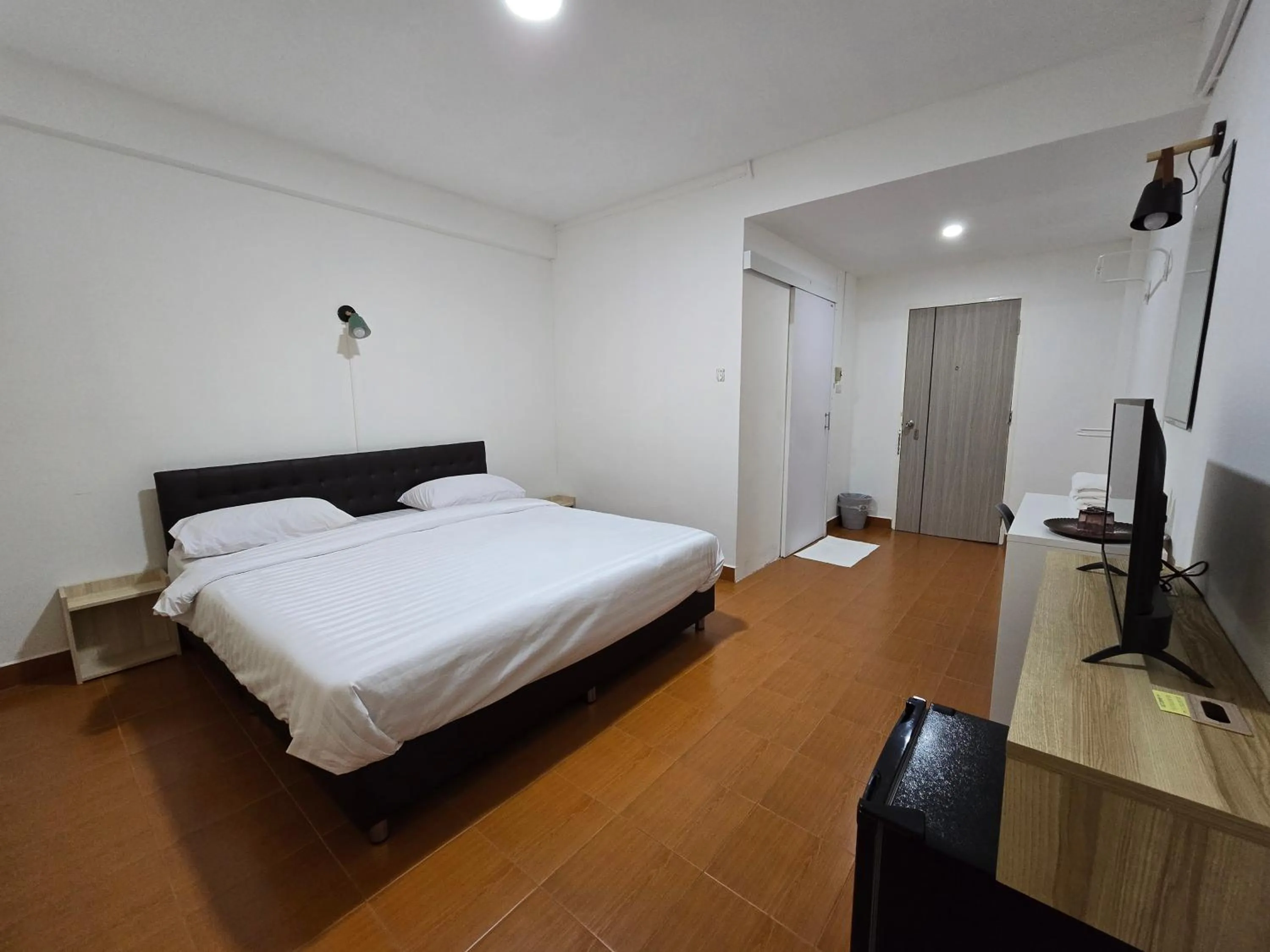 Bed in Ratanasiri Hotel