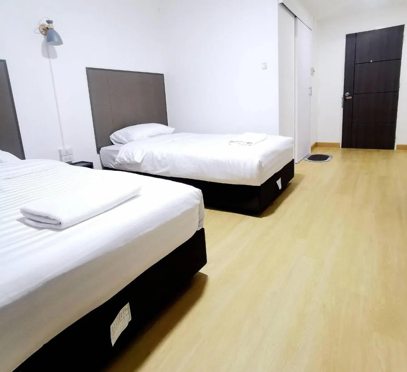 Bed in Ratanasiri Hotel