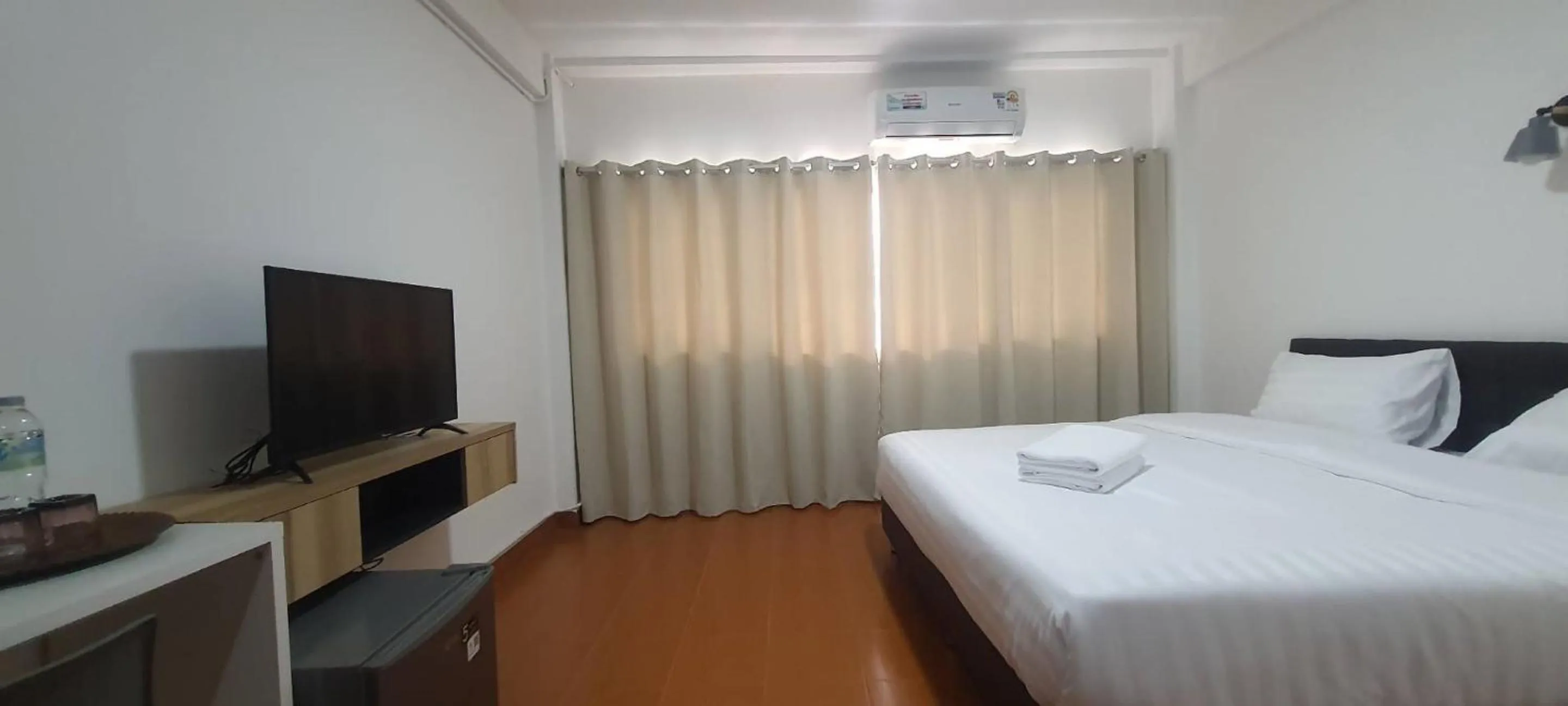 Bed in Ratanasiri Hotel