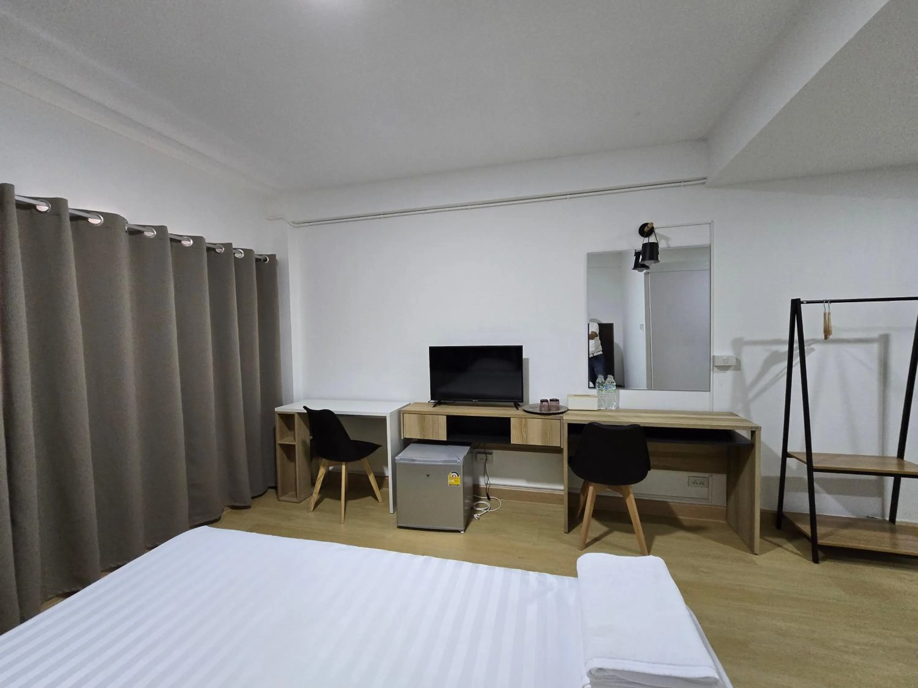 Bed in Ratanasiri Hotel