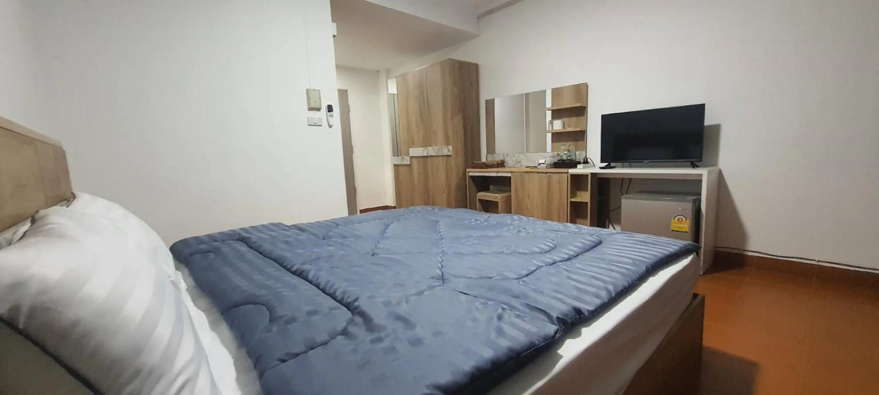 Bed in Ratanasiri Hotel