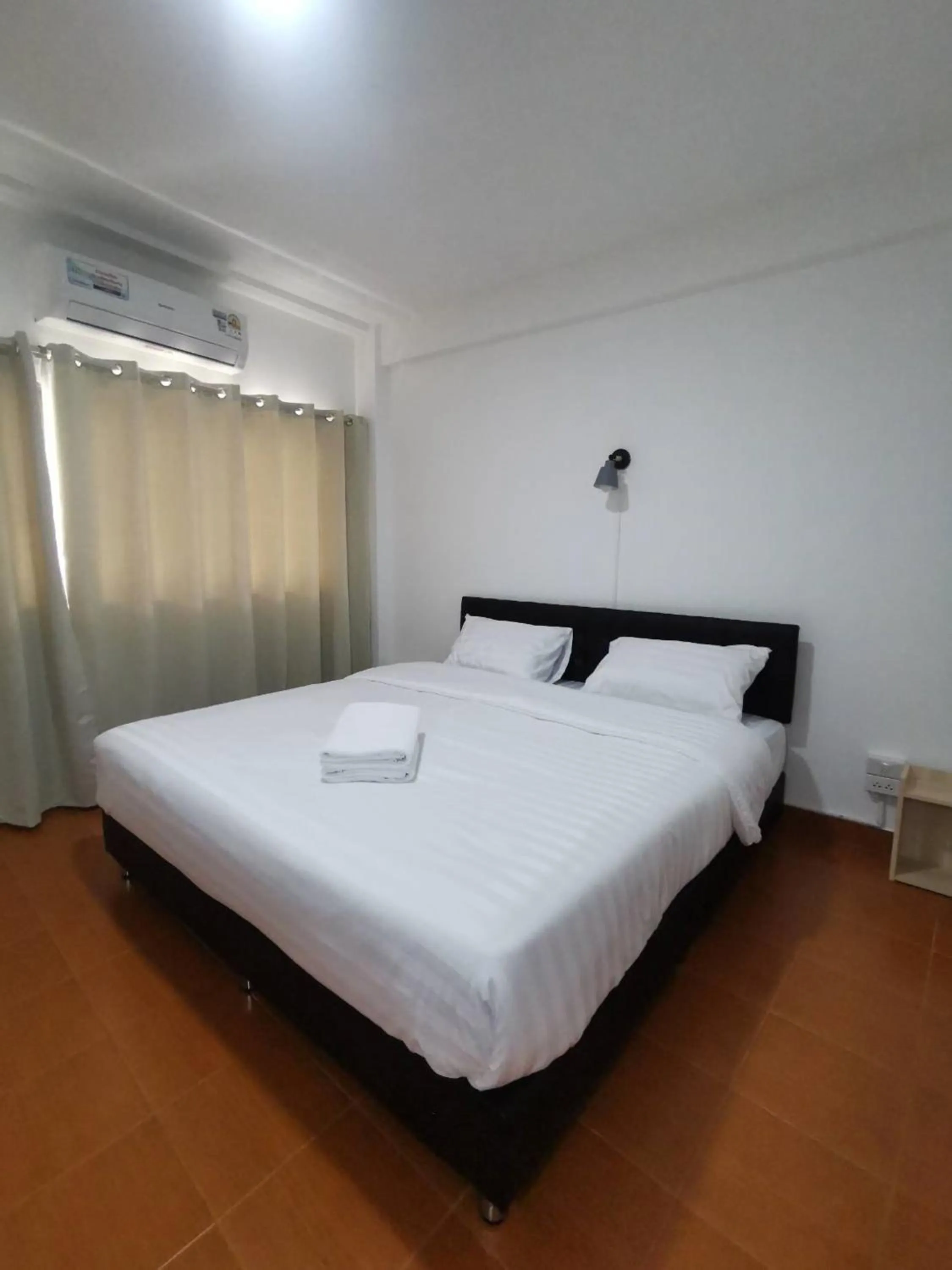 Bed in Ratanasiri Hotel