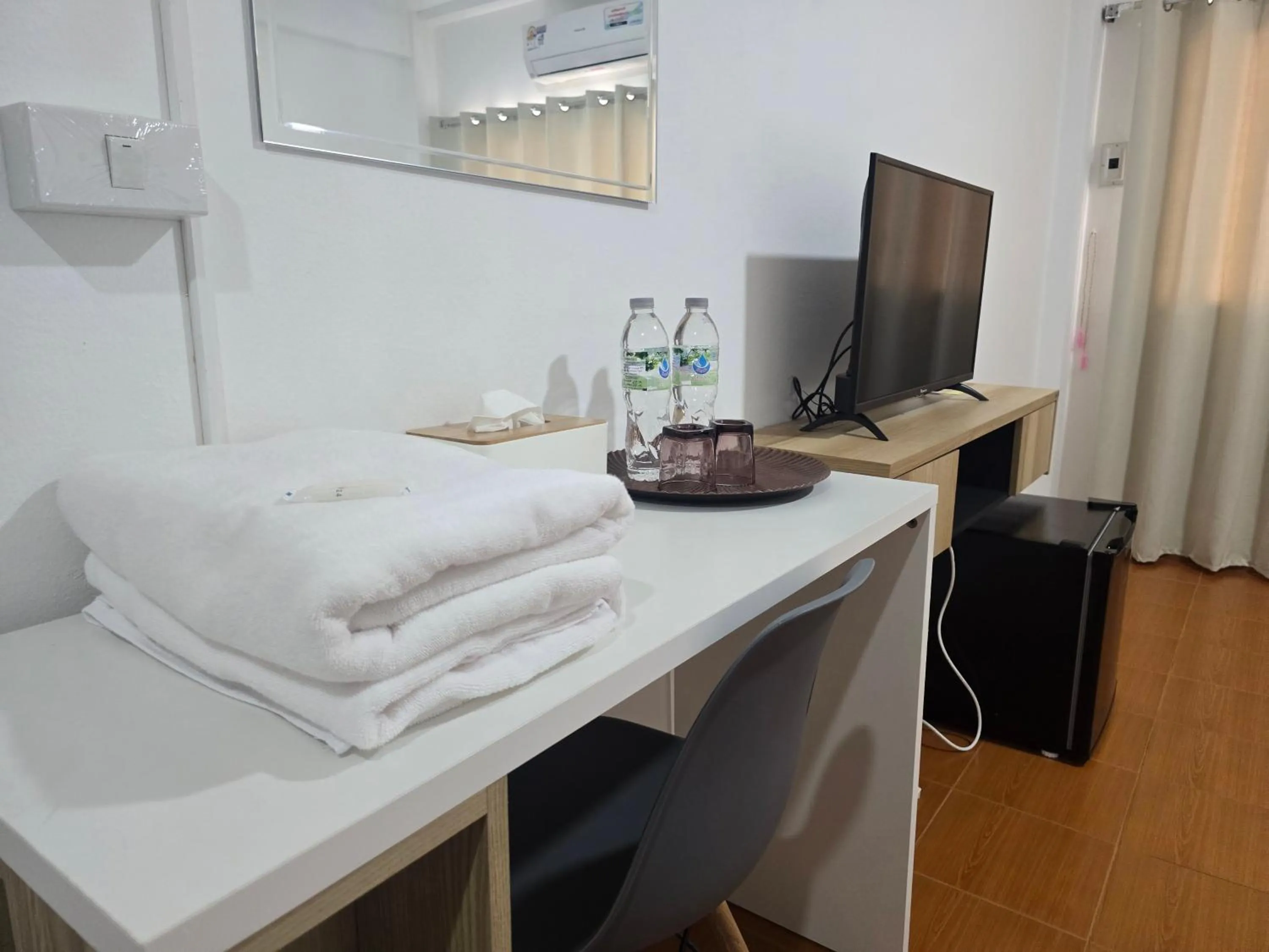 Bed in Ratanasiri Hotel