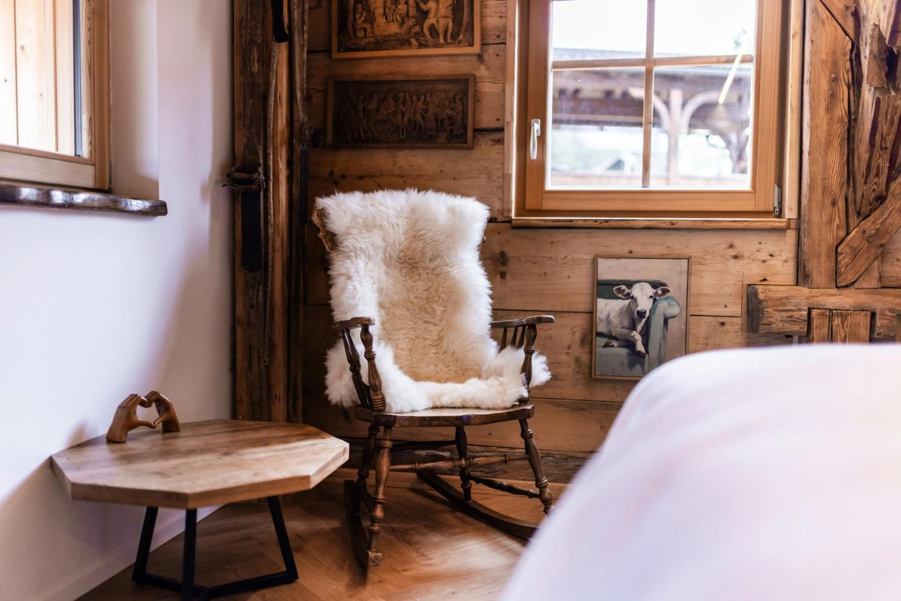Seating area, Bed in Hotel Julian Alps