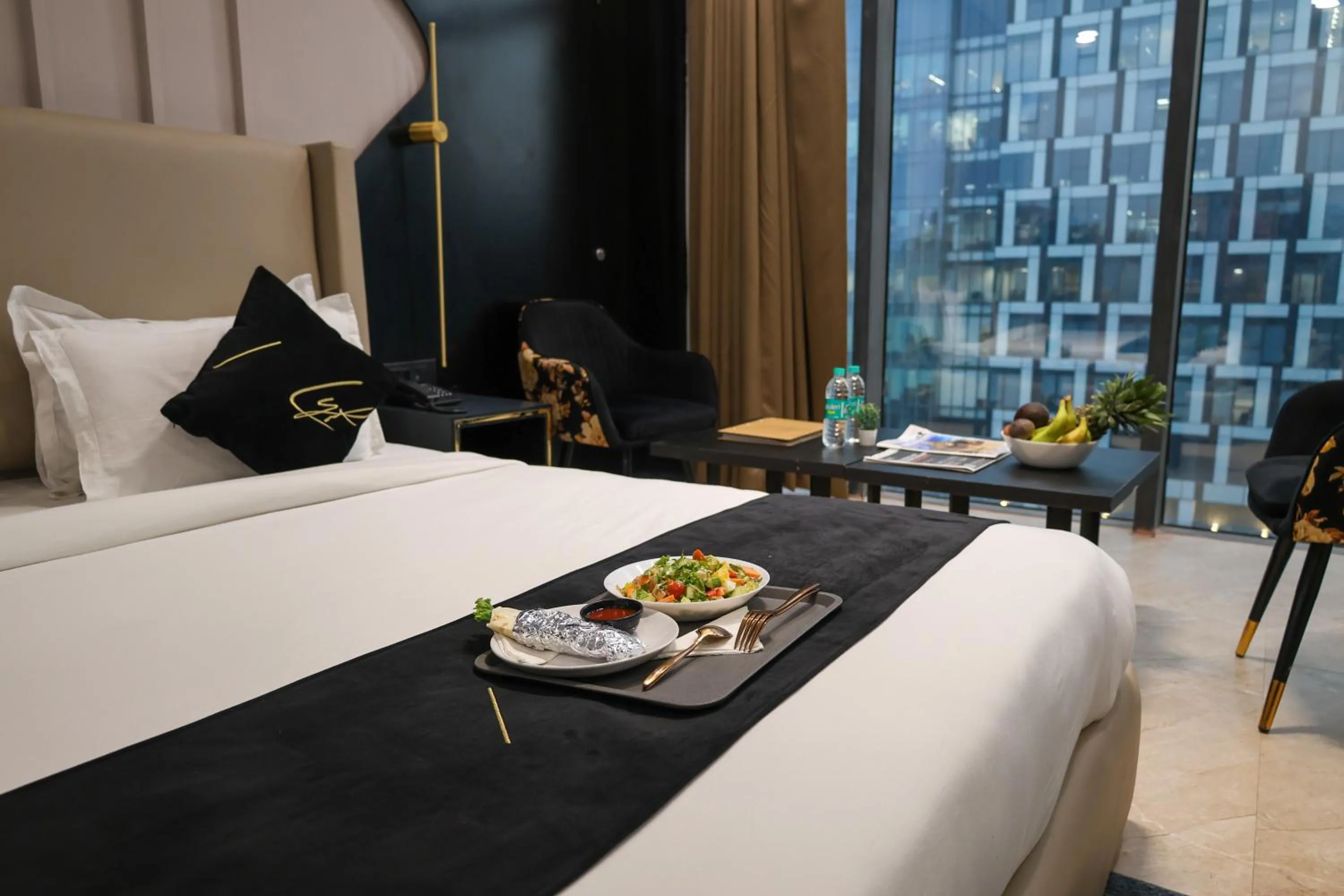 Photo of the whole room, Bed in Aquila Grand Suites - Noida Sector 136