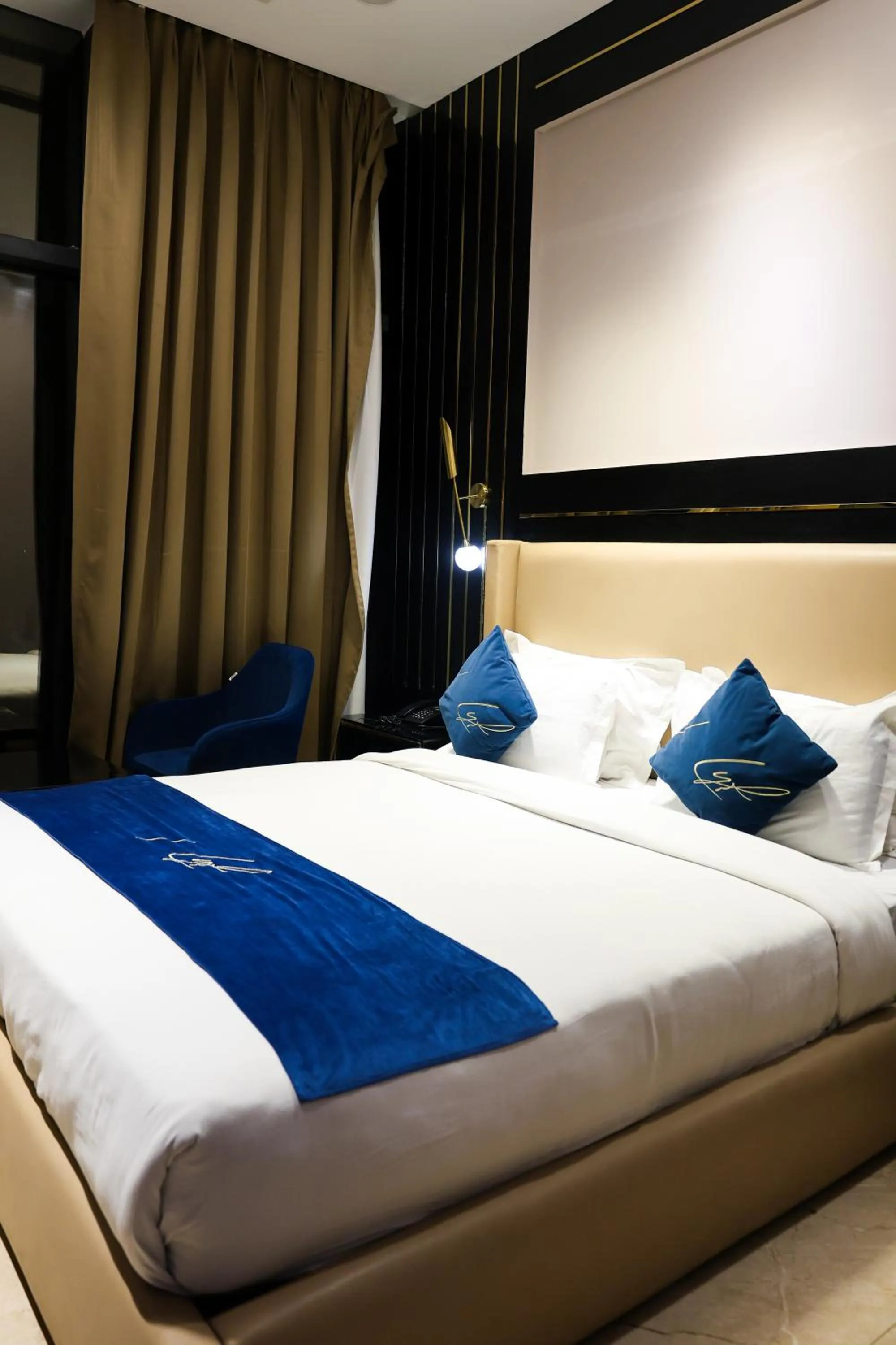 Bedroom, Bed in Aquila Grand Suites - Noida Sector 136