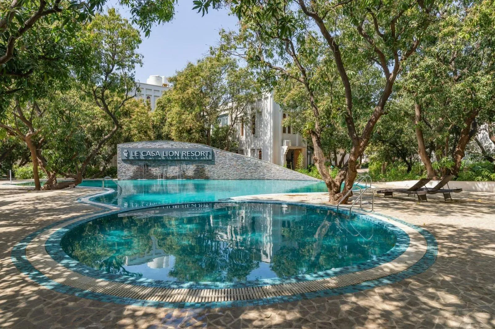 Swimming pool in Le Casa Lion Resort A Premium Resort In Sasan Gir