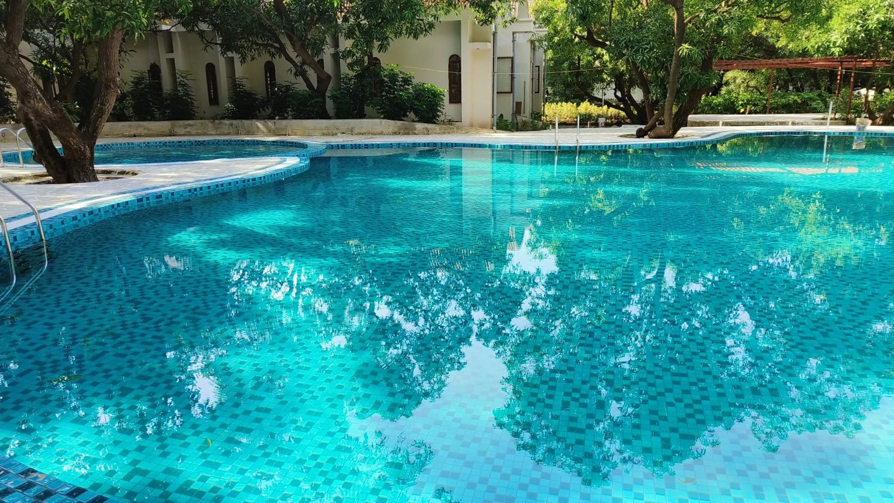 Swimming pool in Le Casa Lion Resort A Premium Resort In Sasan Gir