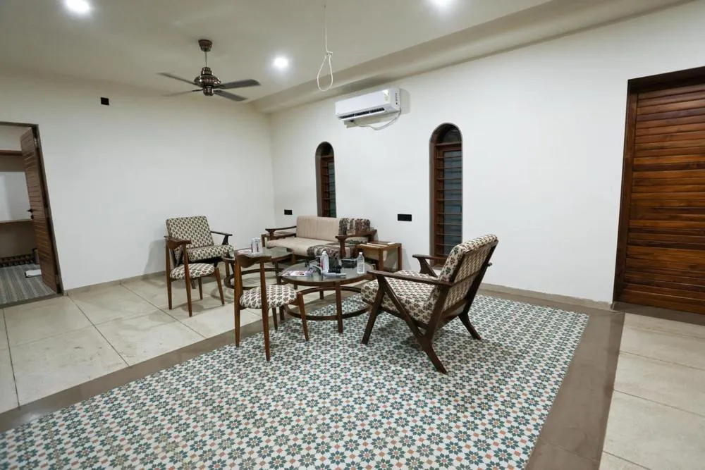 Seating area in Le Casa Lion Resort A Premium Resort In Sasan Gir