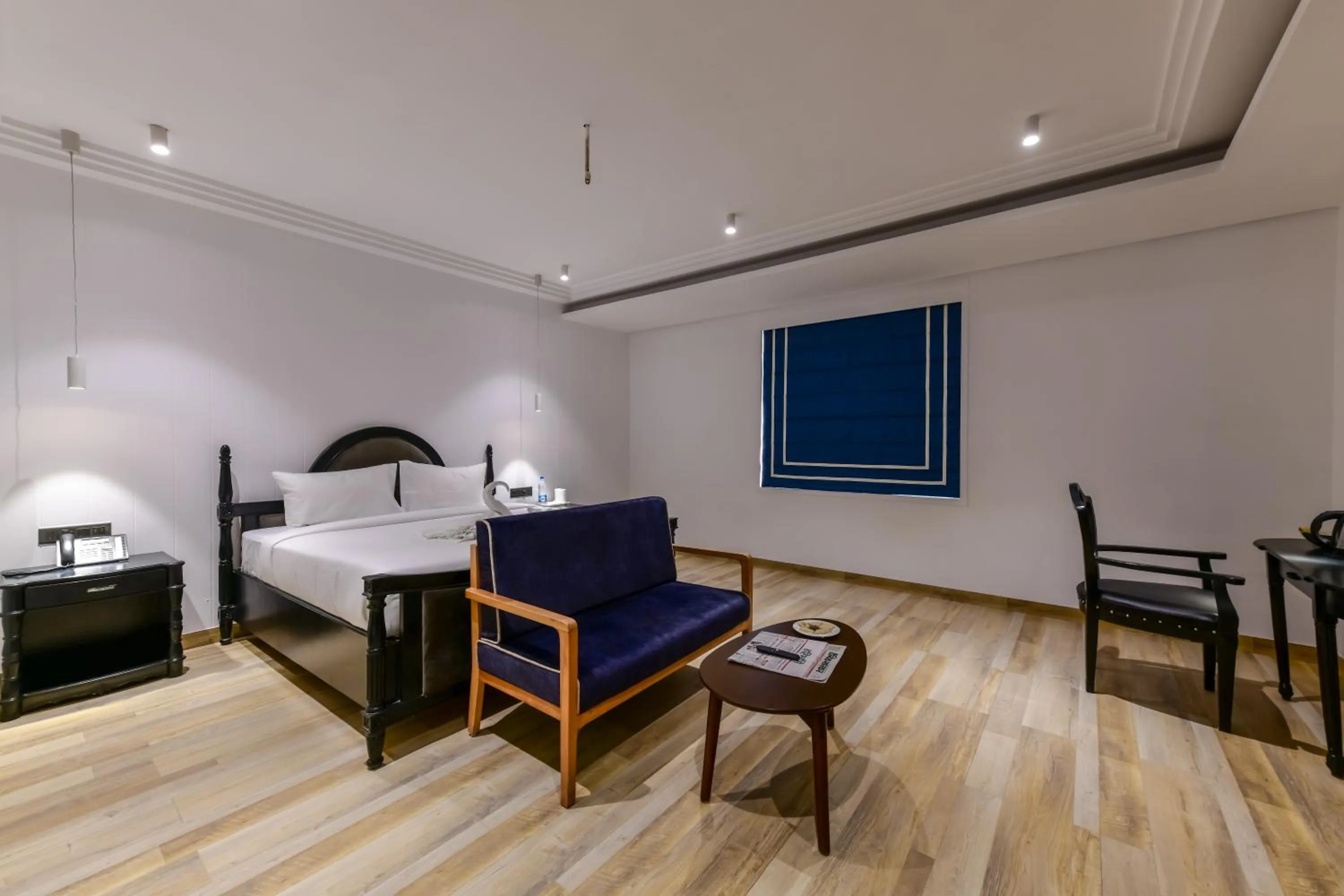 Bedroom, Bed in Regenta Inn Downton Raipur