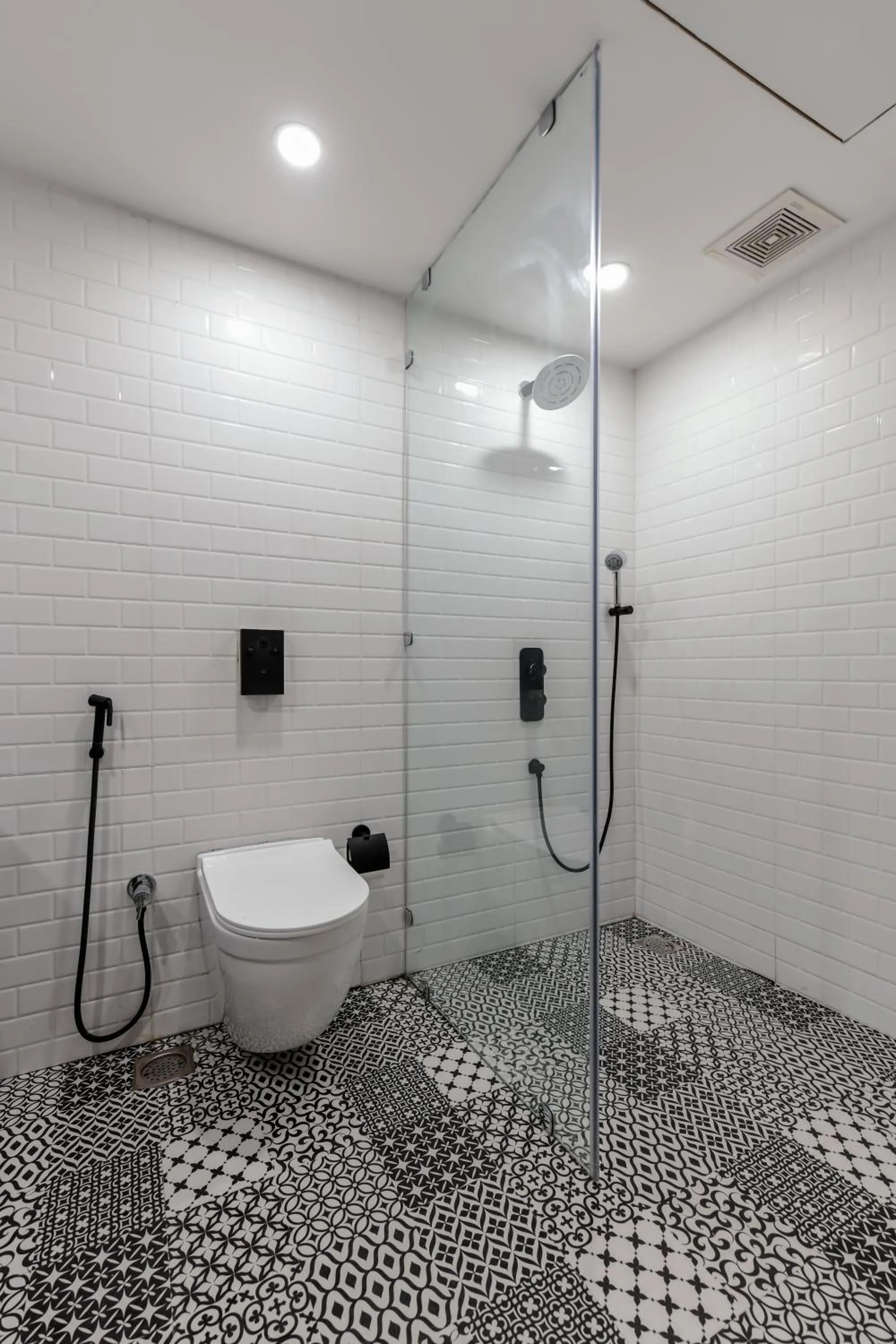 Toilet in Regenta Inn Downton Raipur