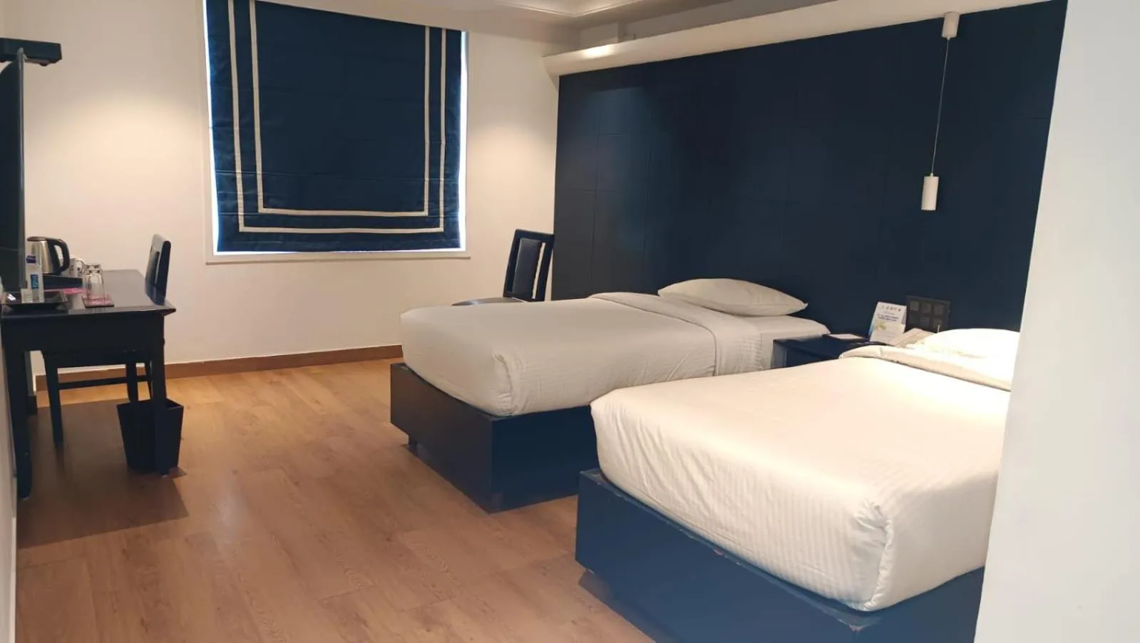 Bed in Regenta Inn Downton Raipur