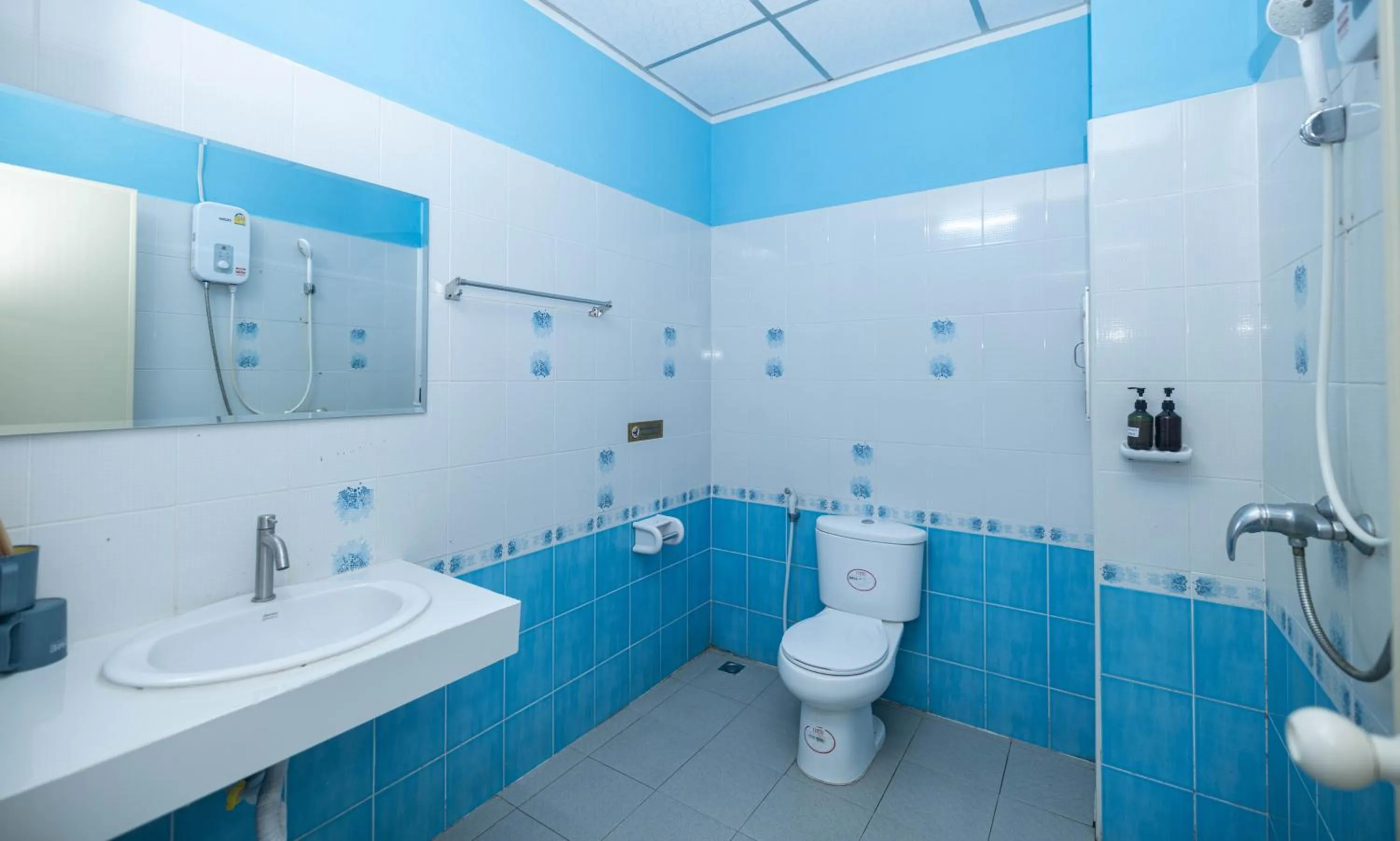 Shower in Belle Cose Guest House Phuket