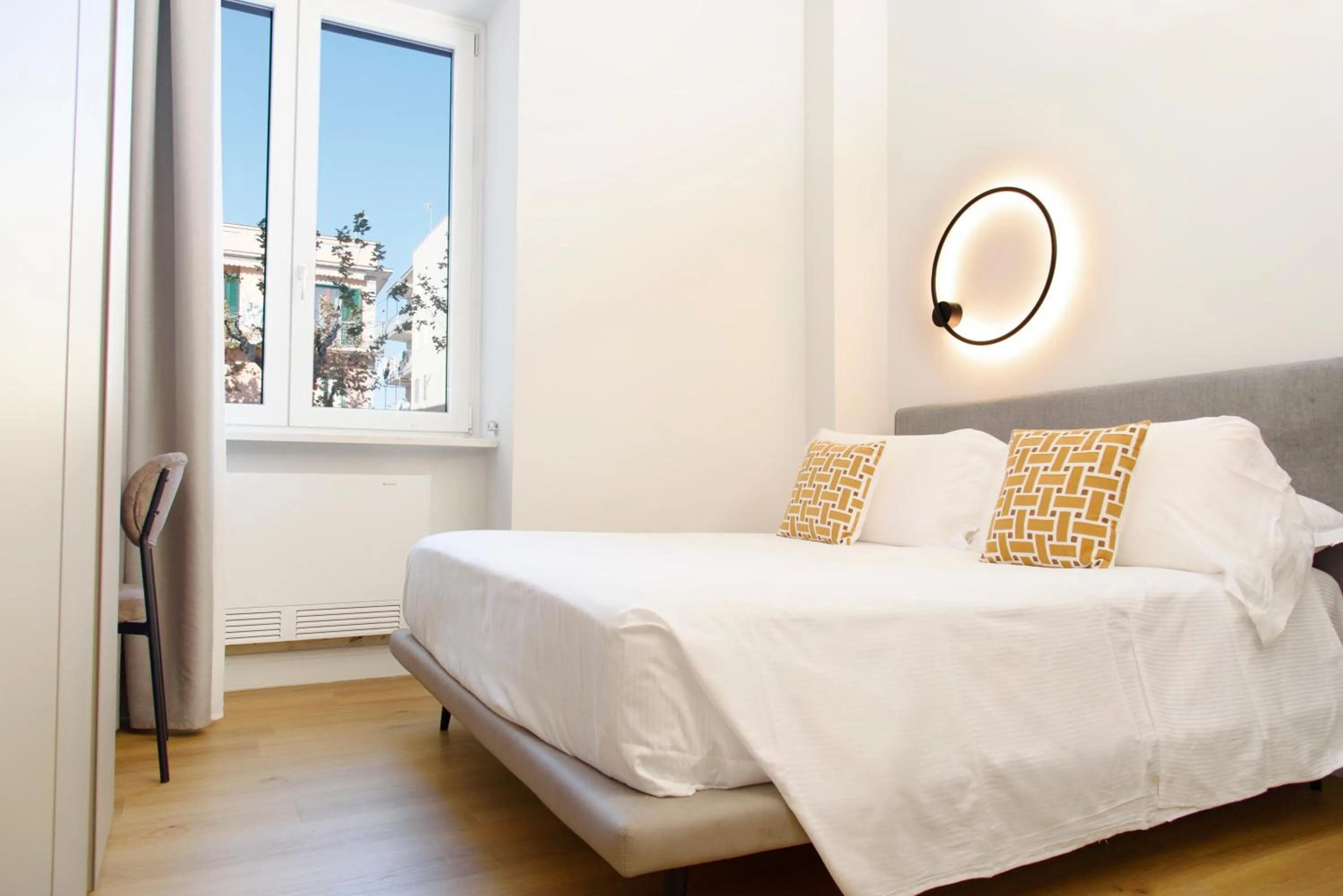 Bed in Vesuvius Palace Aparthotel