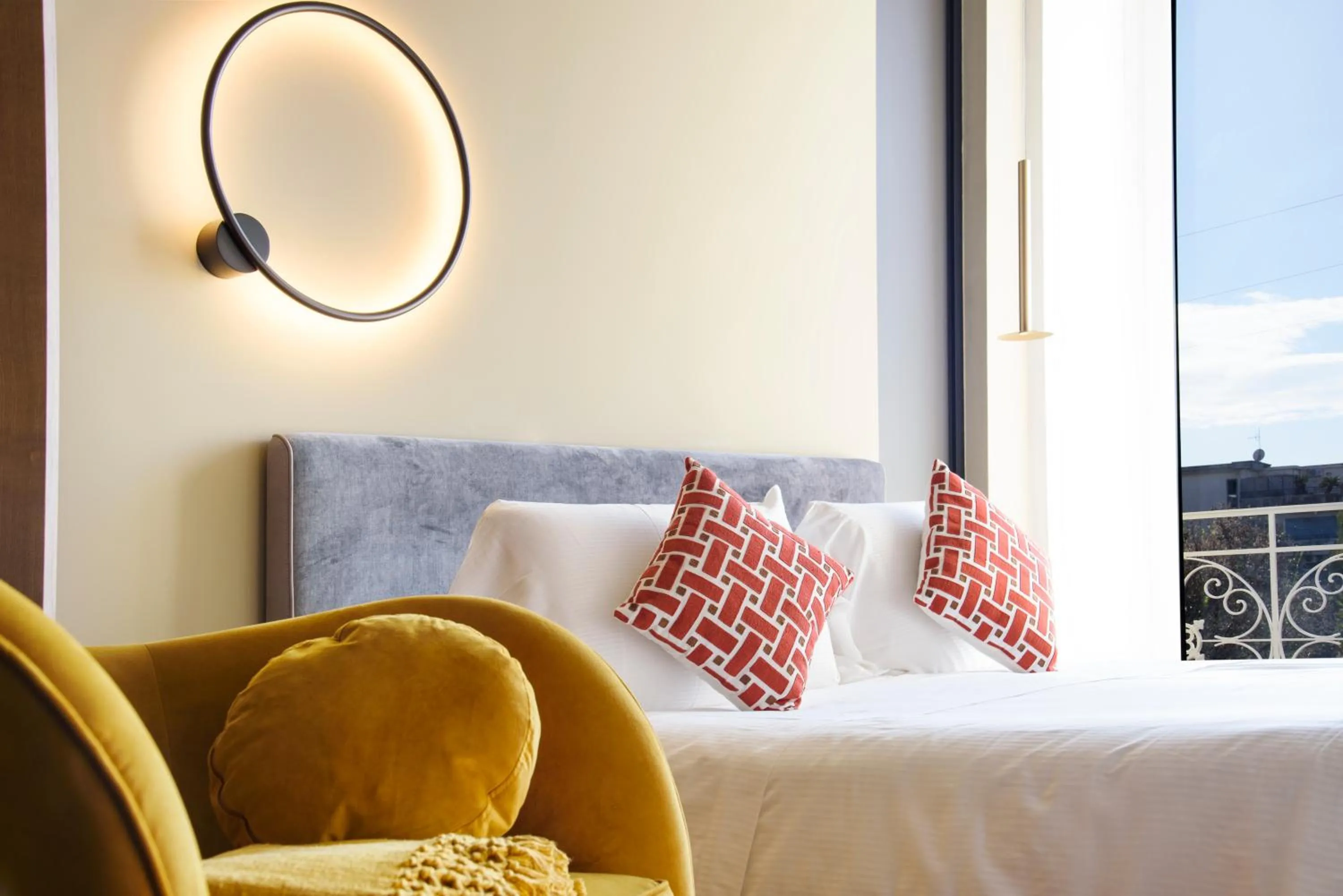 Bed in Vesuvius Palace Aparthotel