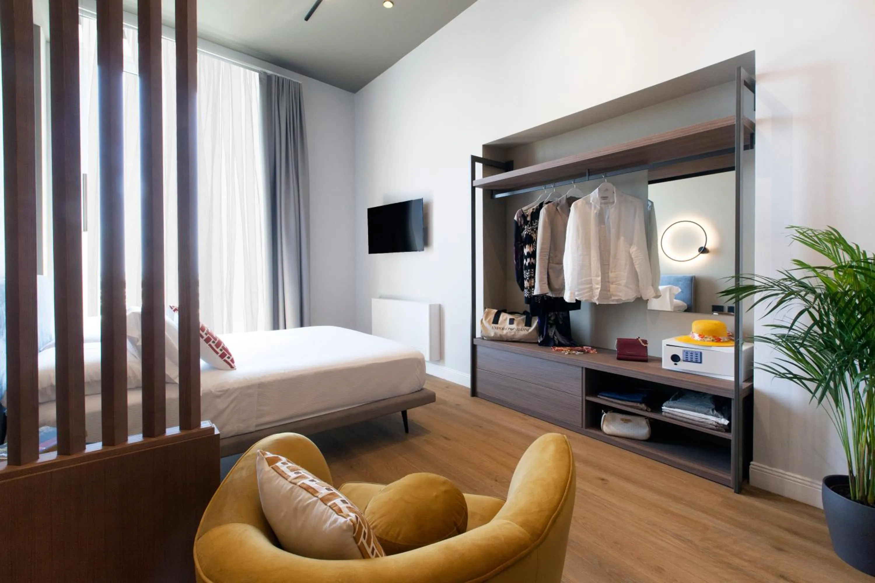 Bed in Vesuvius Palace Aparthotel