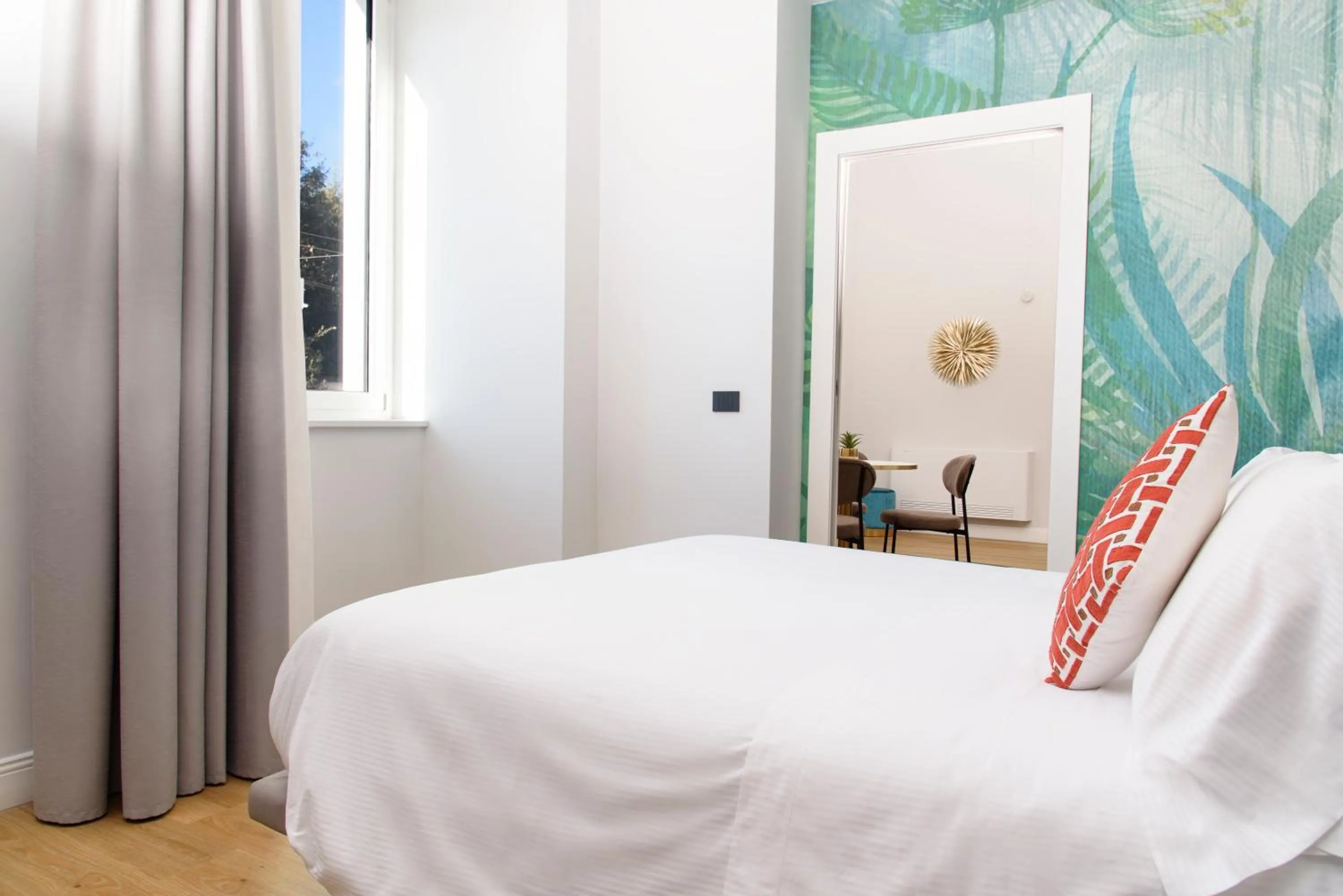 Bed in Vesuvius Palace Aparthotel