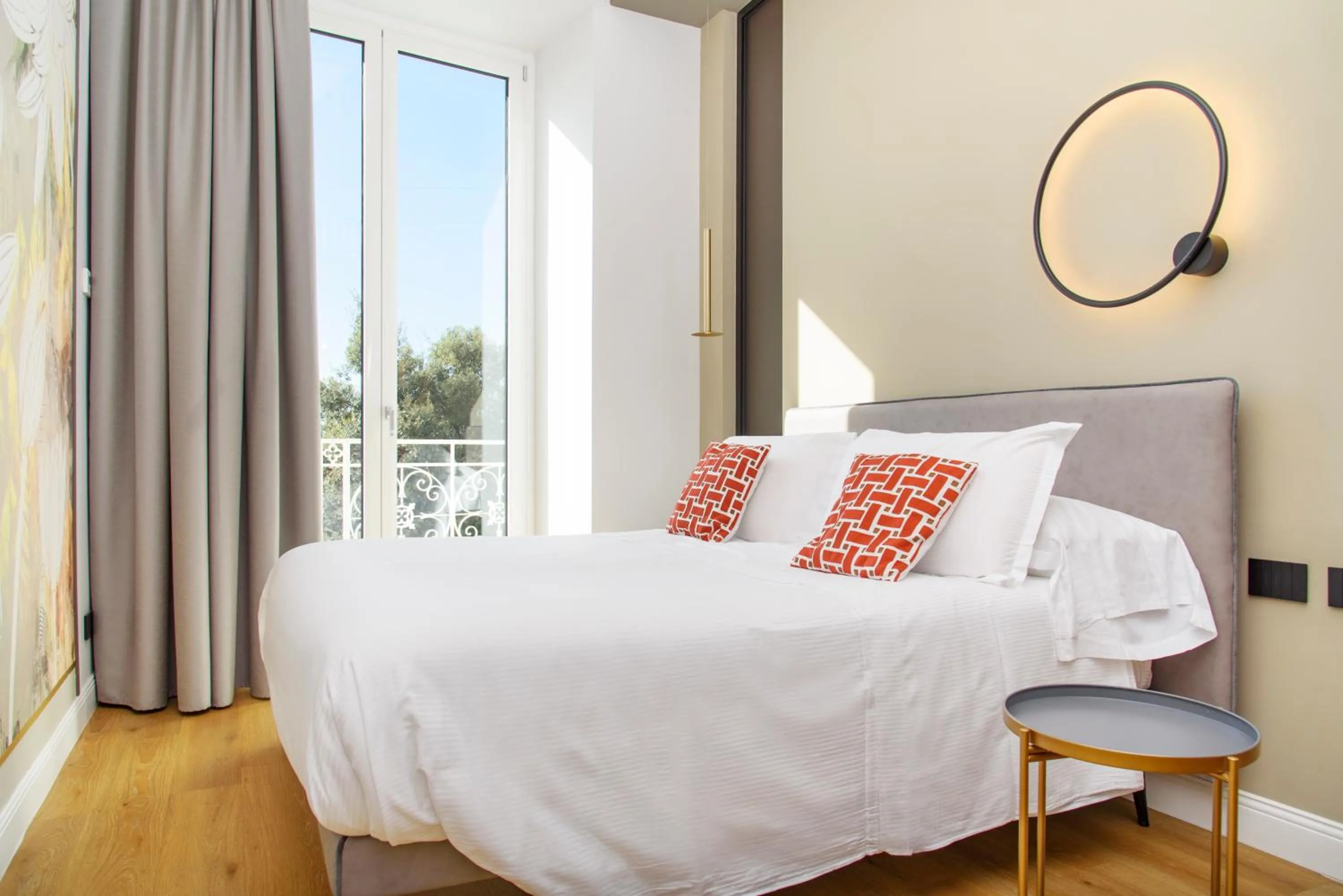 Bed in Vesuvius Palace Aparthotel