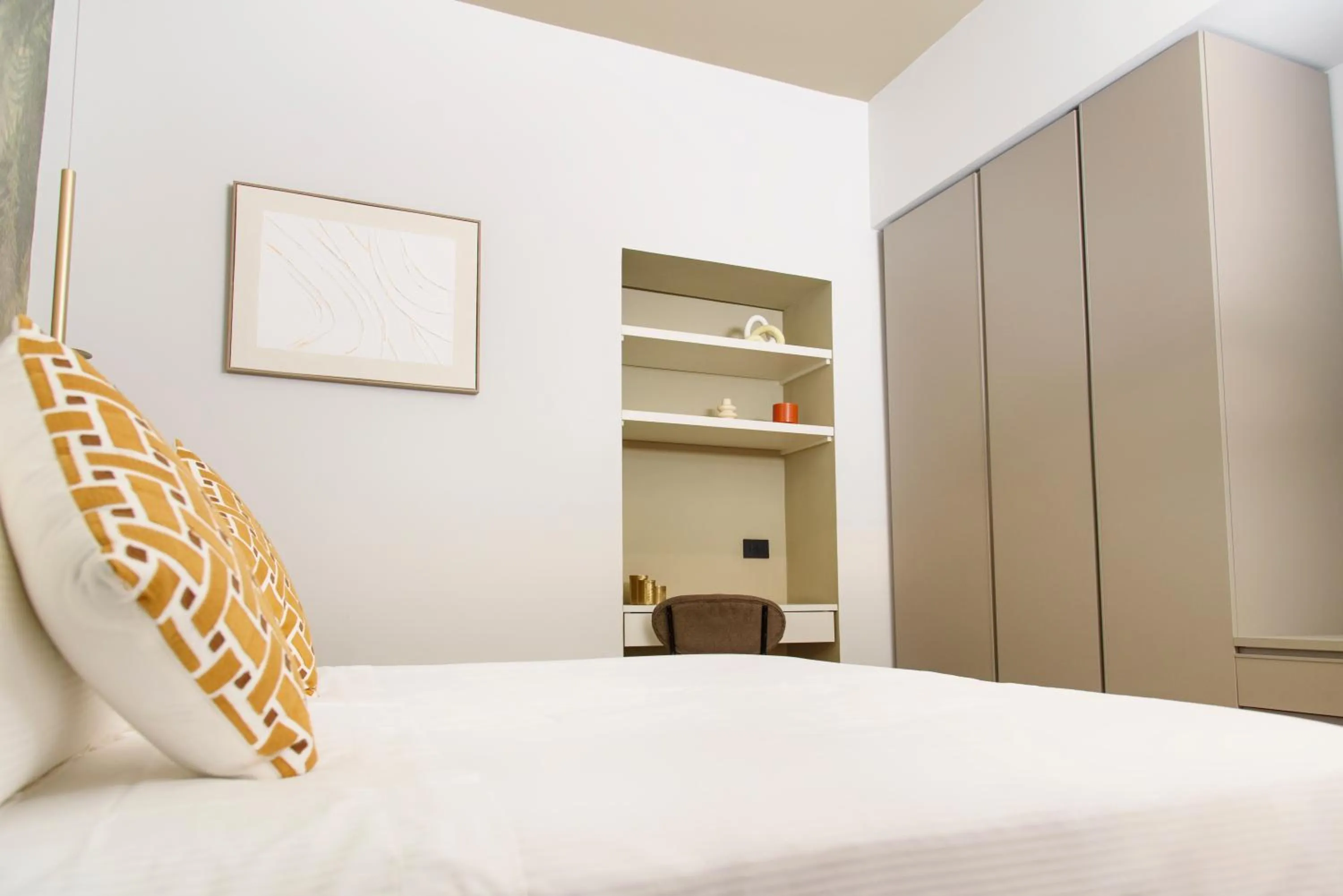 Bed in Vesuvius Palace Aparthotel