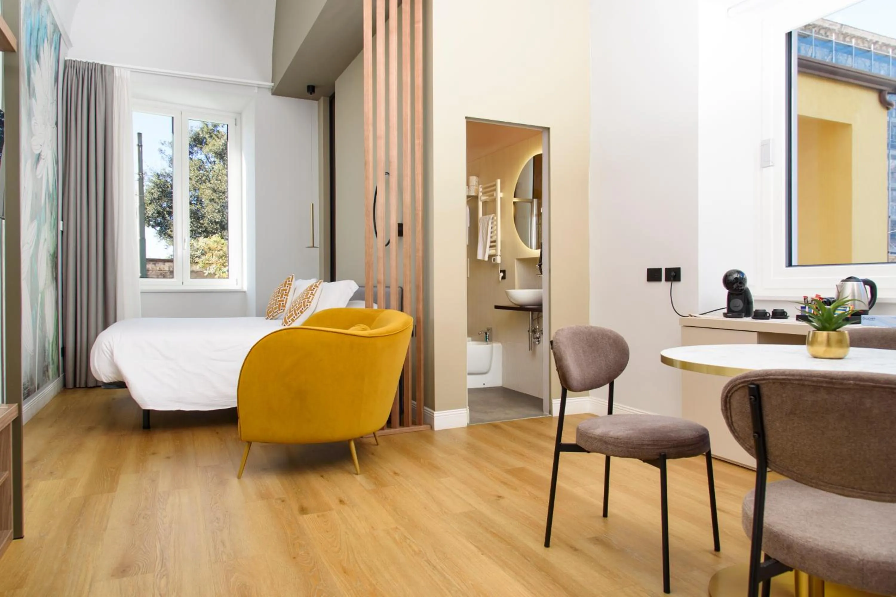 Bed in Vesuvius Palace Aparthotel