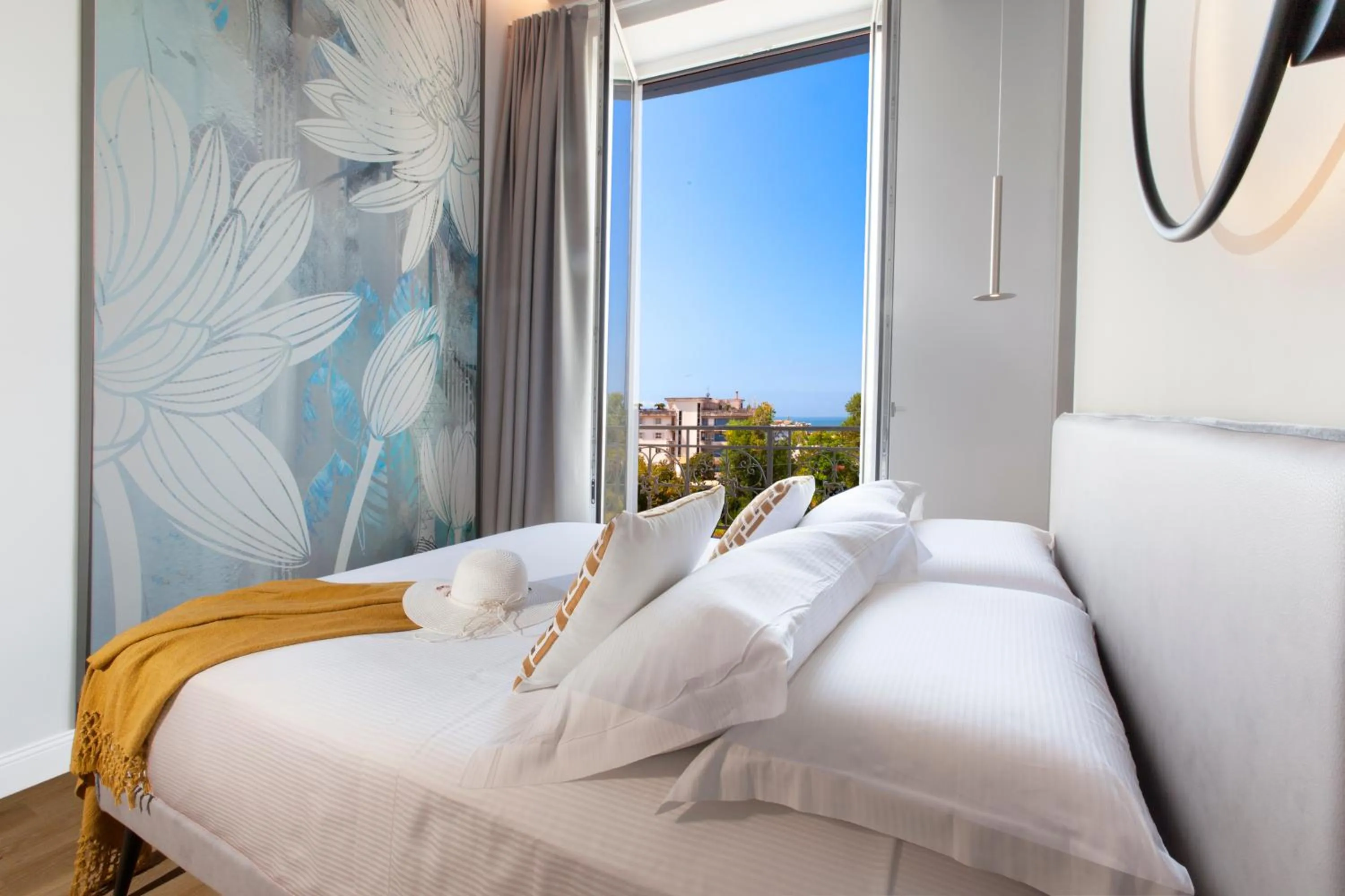 Bed in Vesuvius Palace Aparthotel