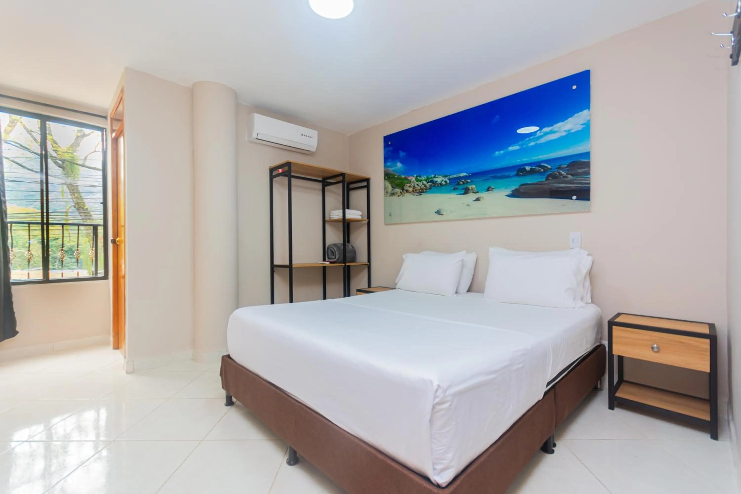 Bed in Hotel Tropical San Jeronimo