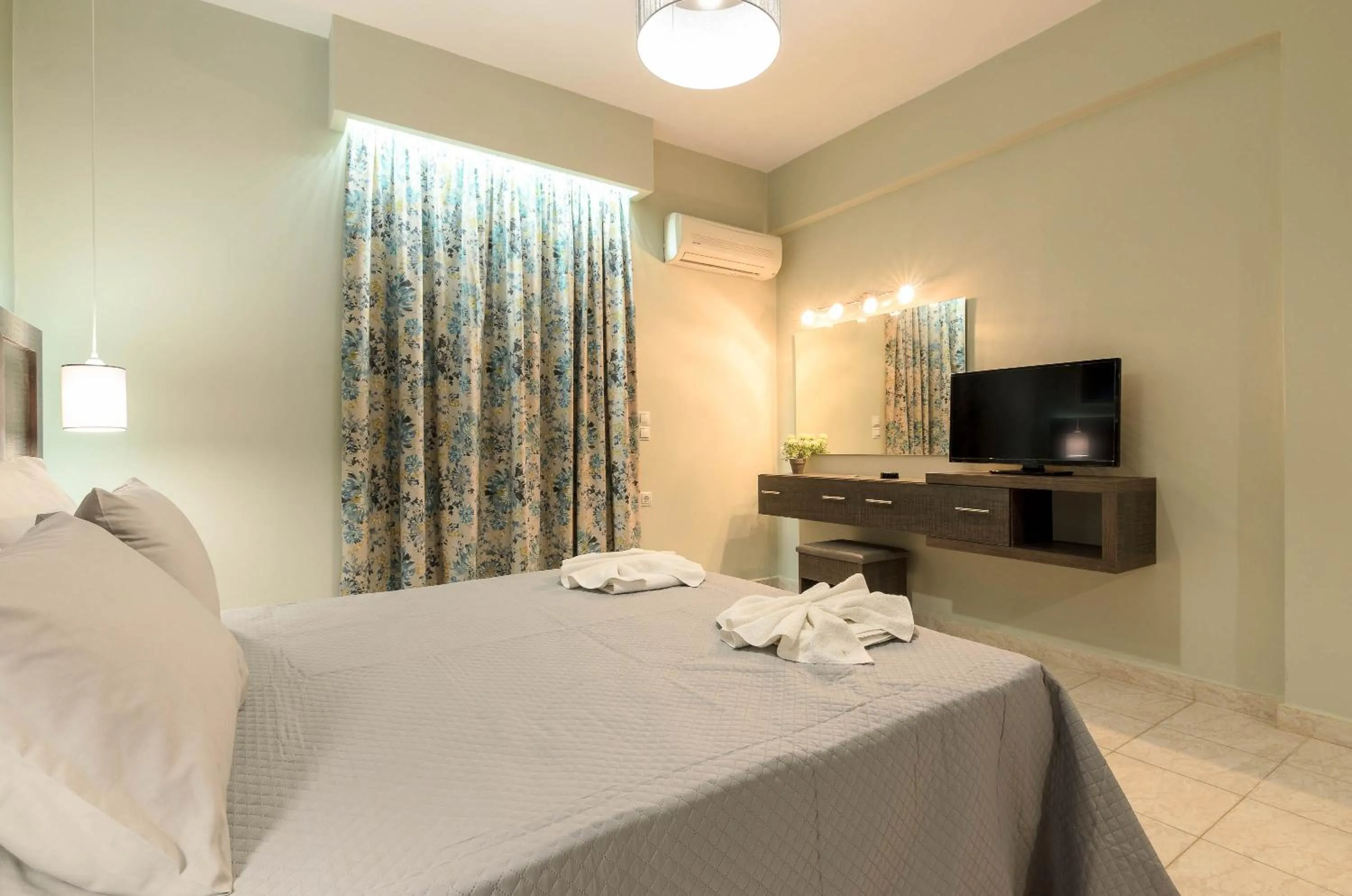 Bed in Artemis Apartments