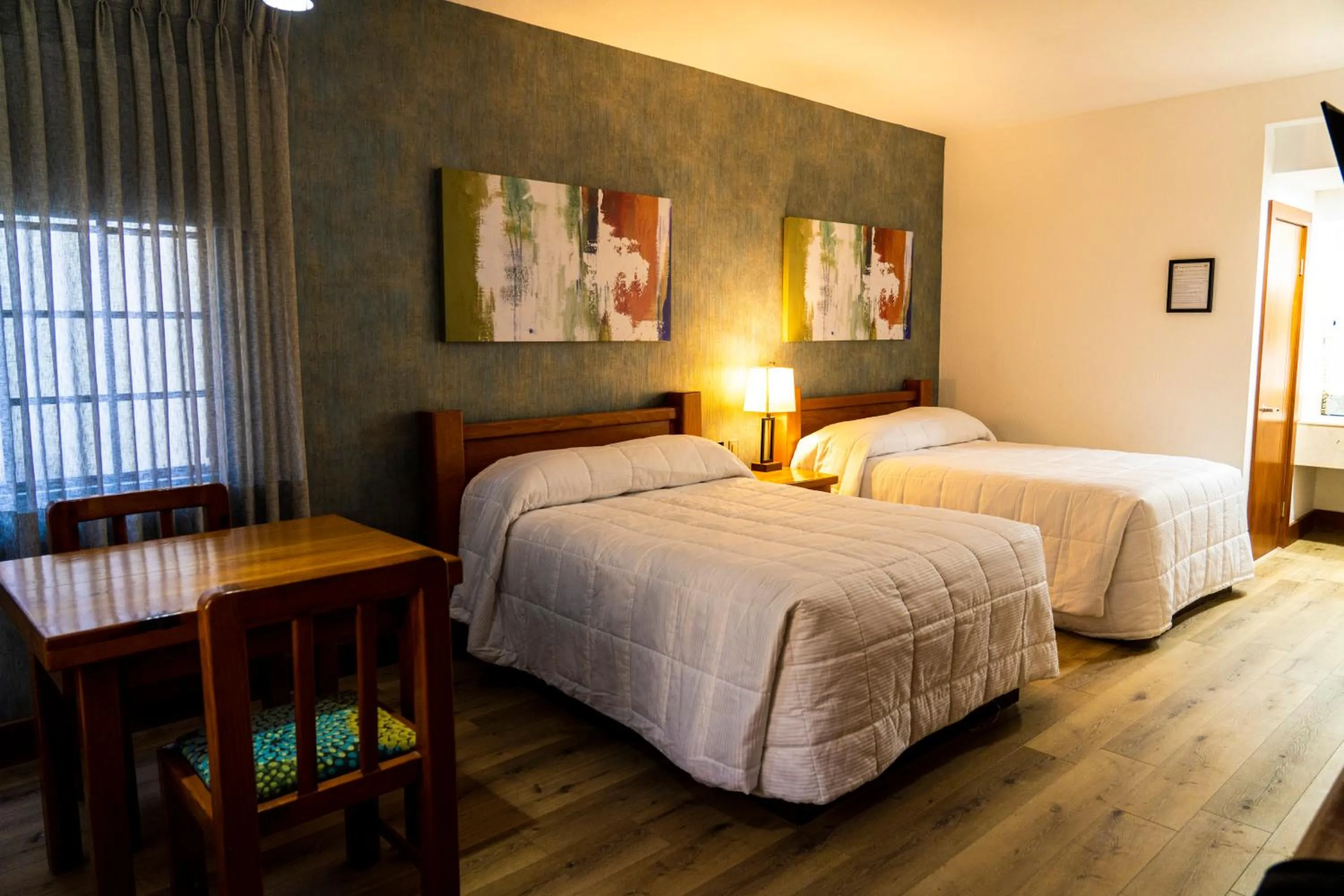 Bed in Hotel Suites El Paseo