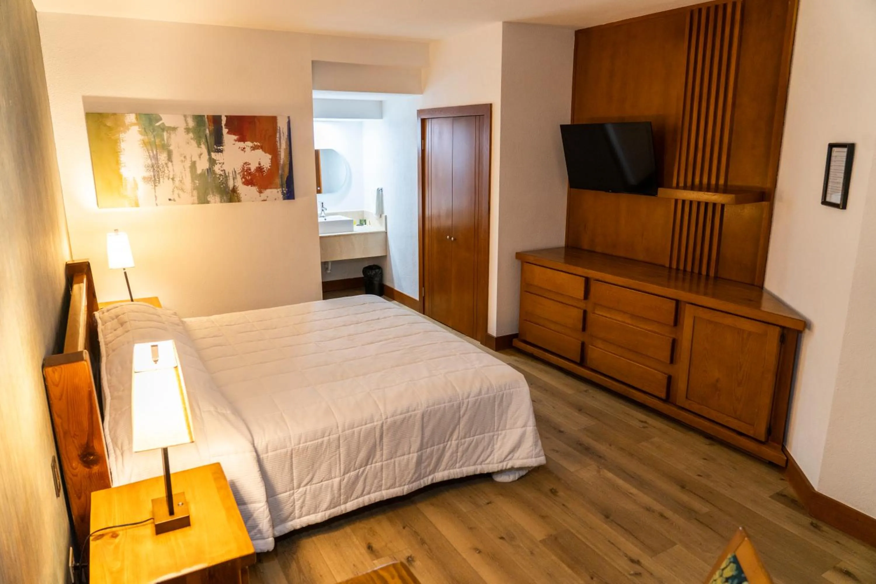 Bed in Hotel Suites El Paseo