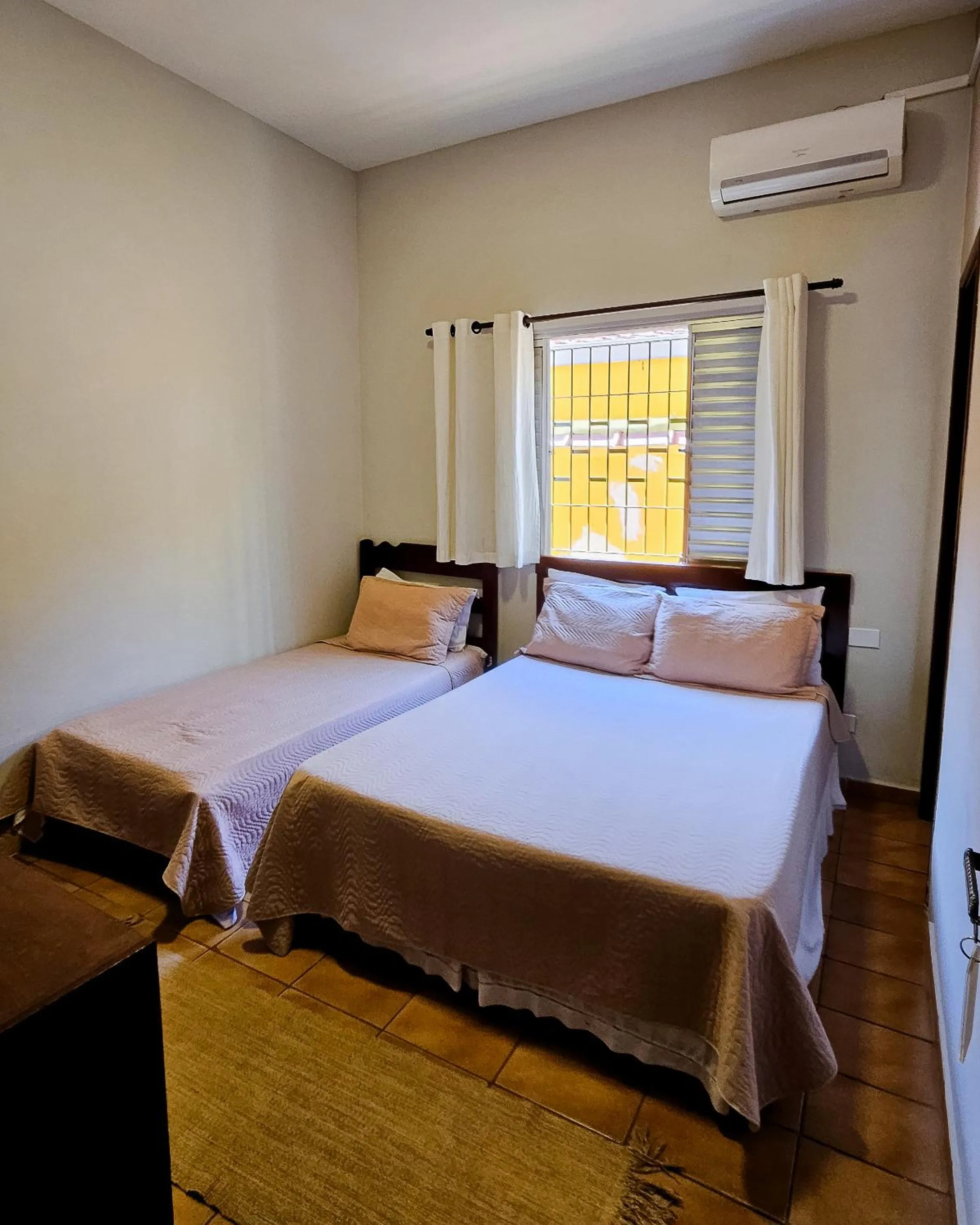 Bed in Pousada Amanhecer do Itaguá