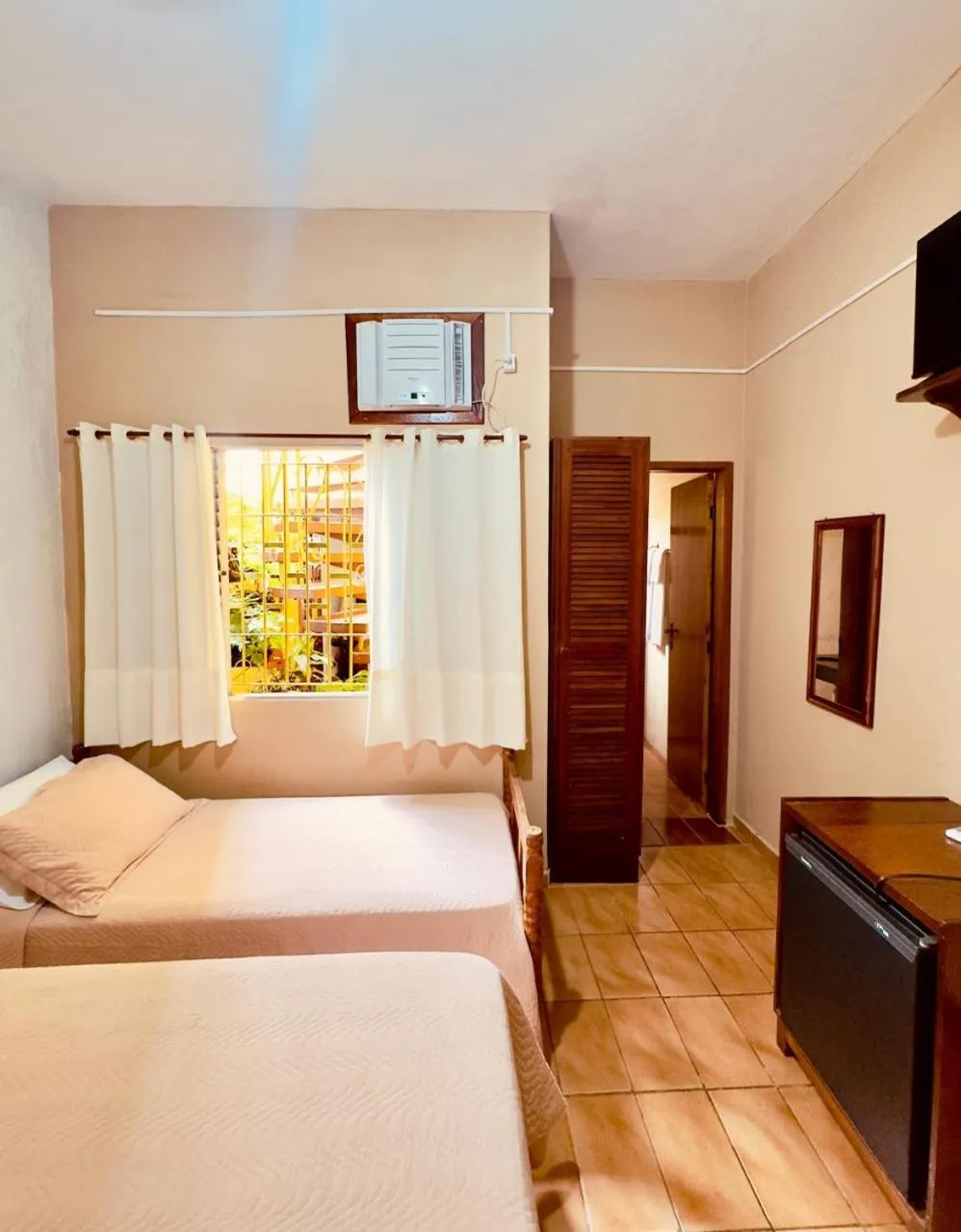 Bed in Pousada Amanhecer do Itaguá