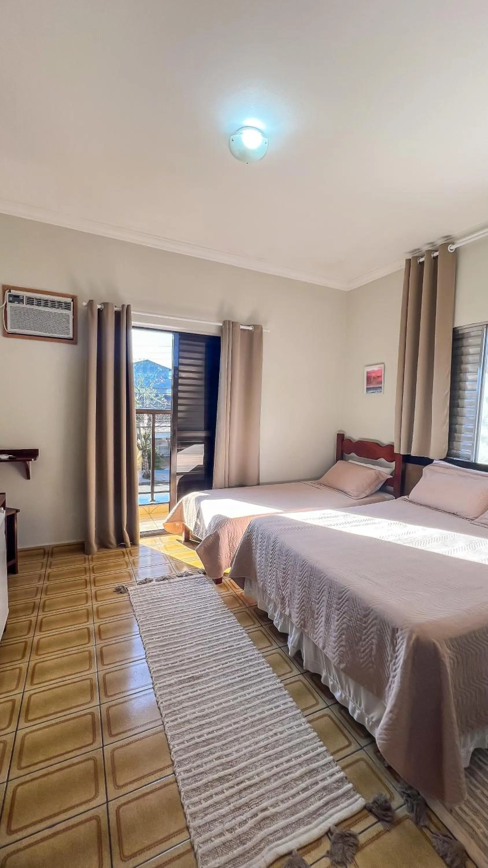 Bed in Pousada Amanhecer do Itaguá