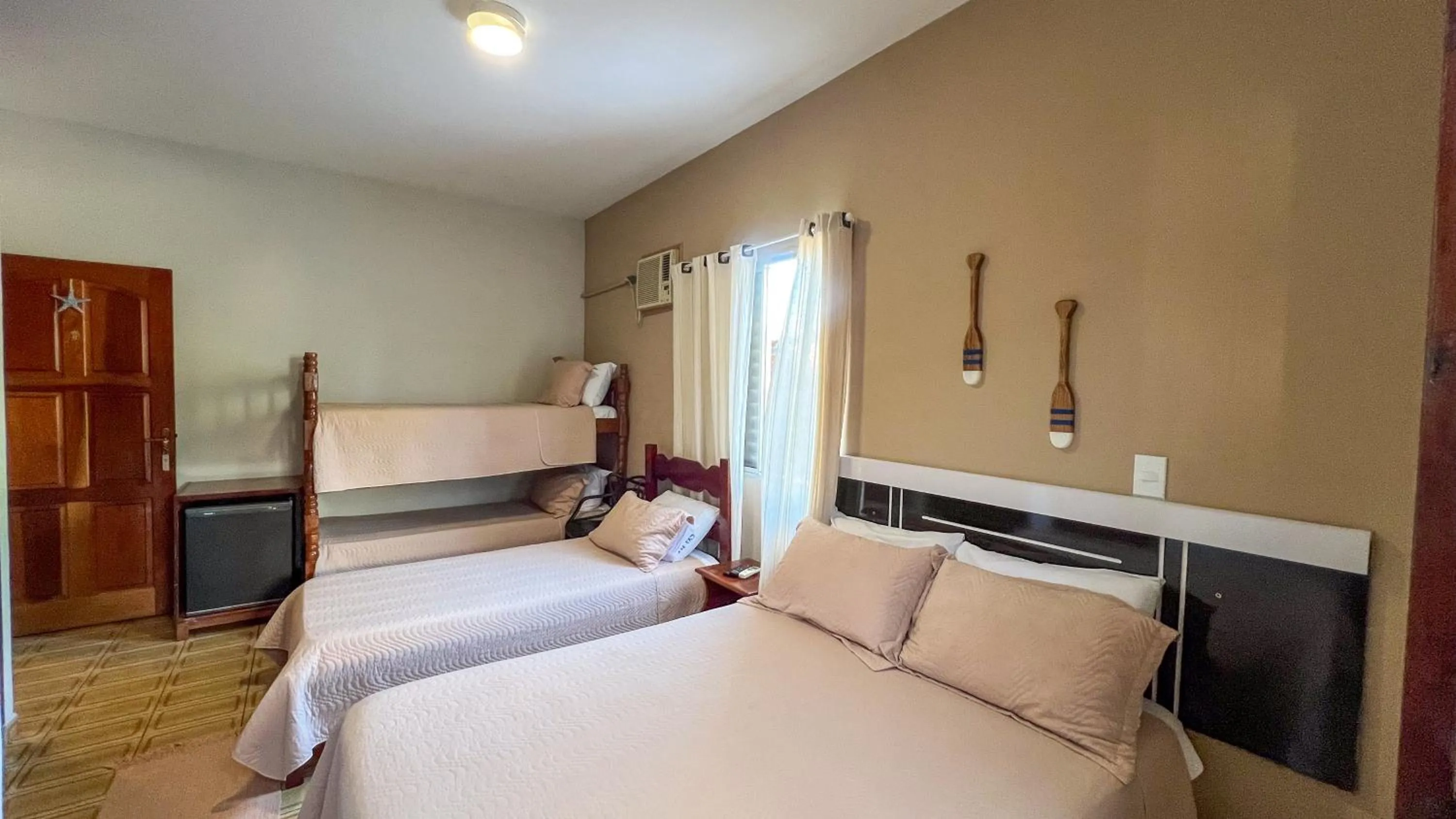 Bed in Pousada Amanhecer do Itaguá