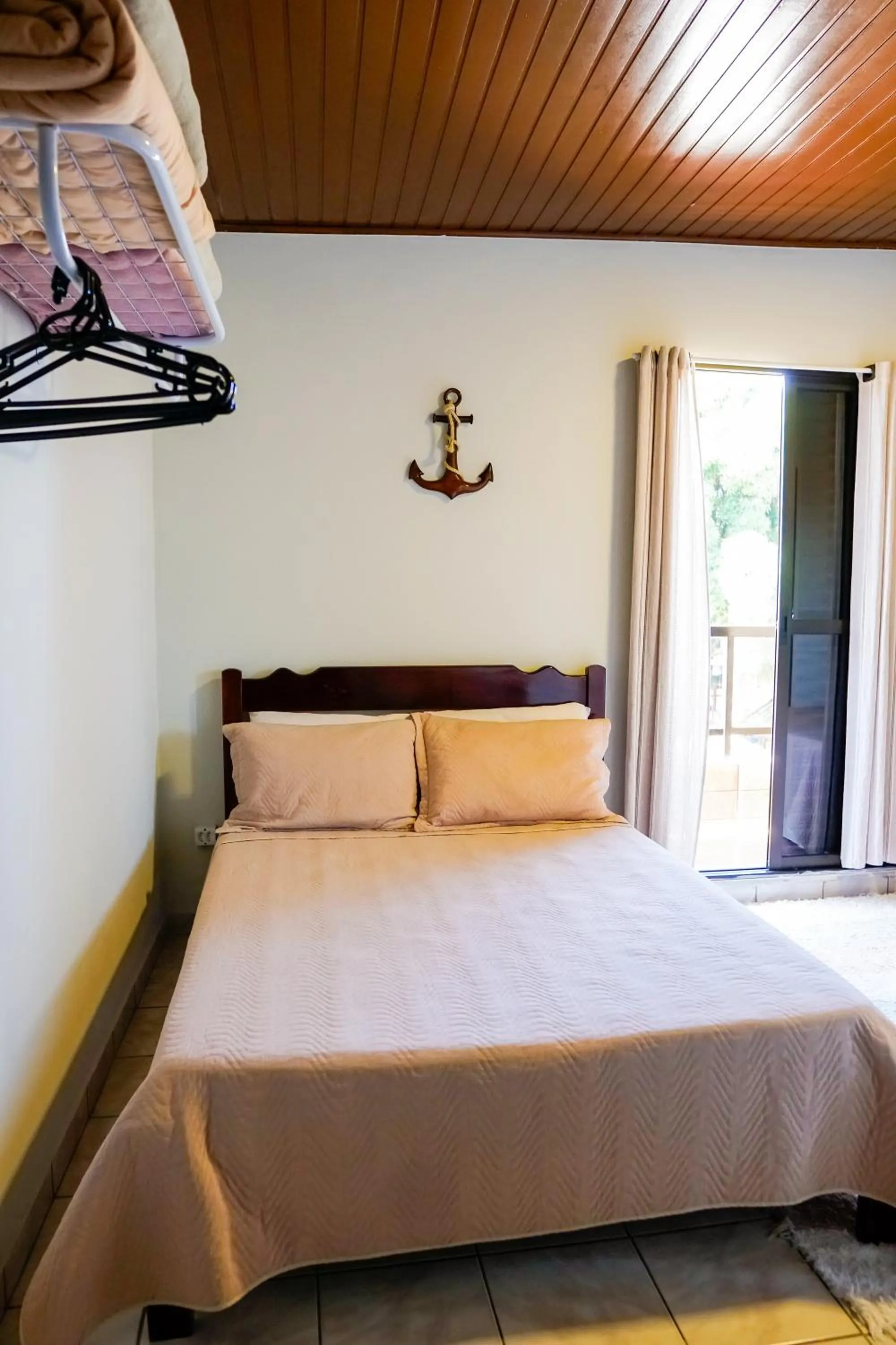 Bed in Pousada Amanhecer do Itaguá