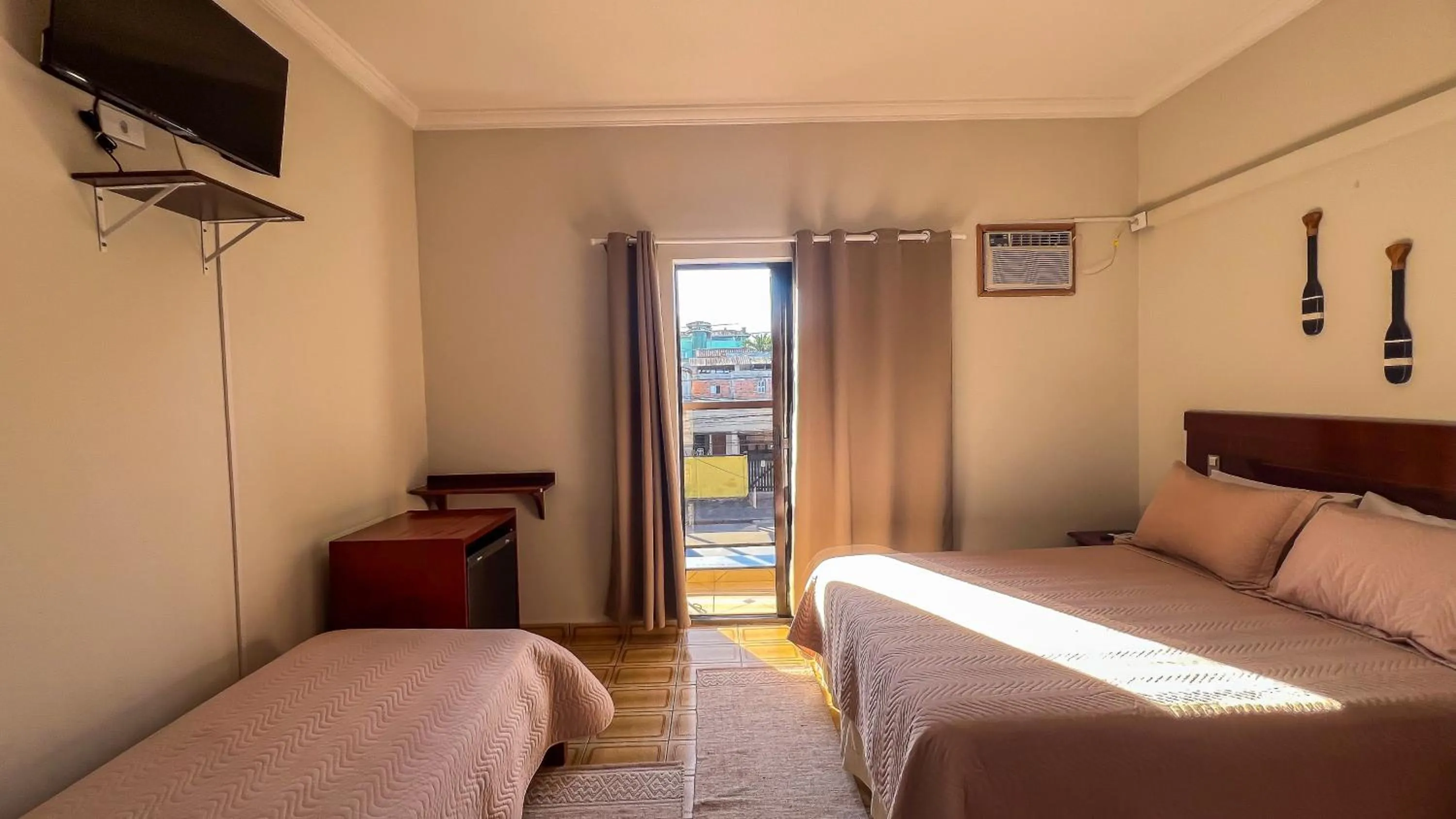 TV and multimedia in Pousada Amanhecer do Itaguá