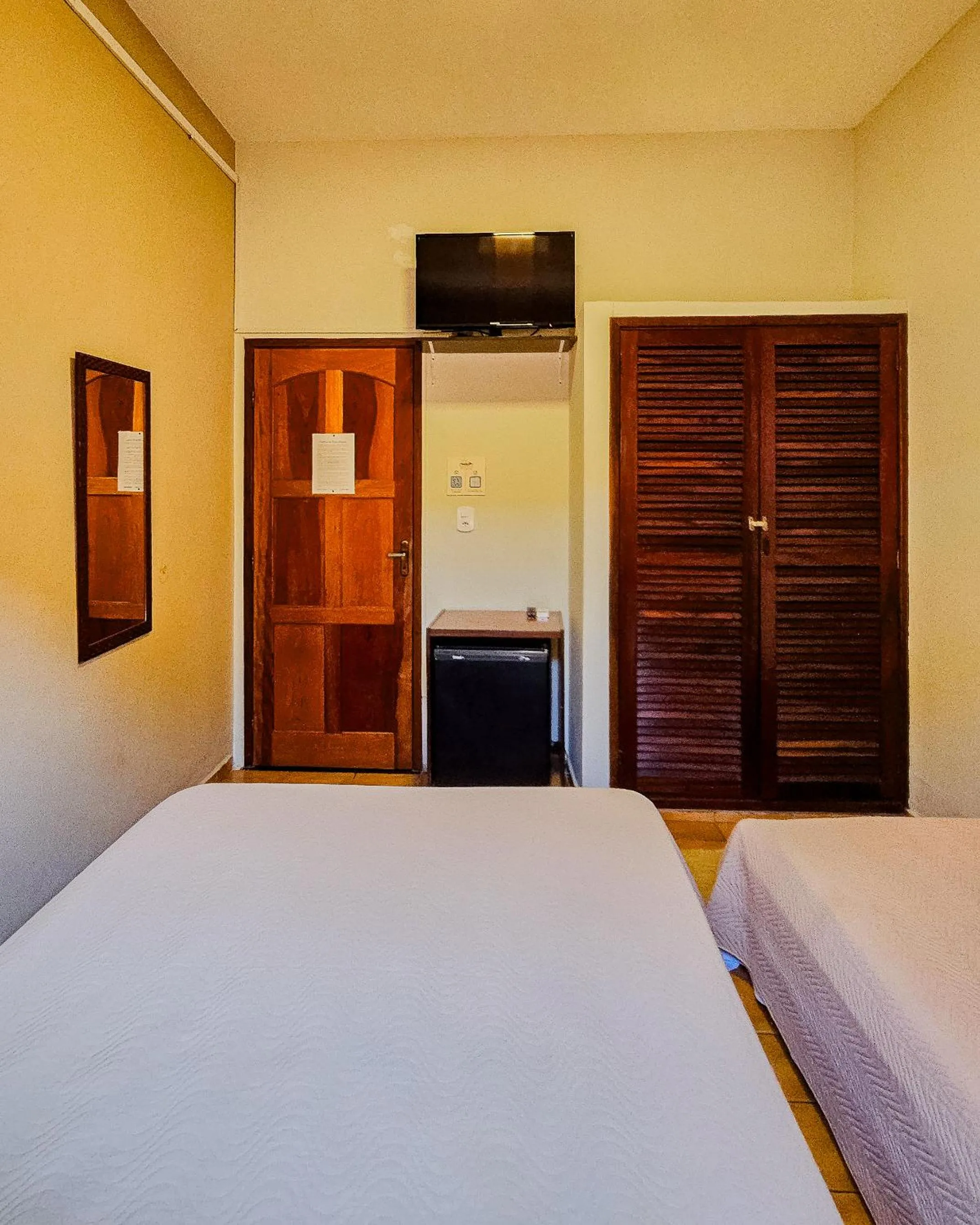 Bed in Pousada Amanhecer do Itaguá