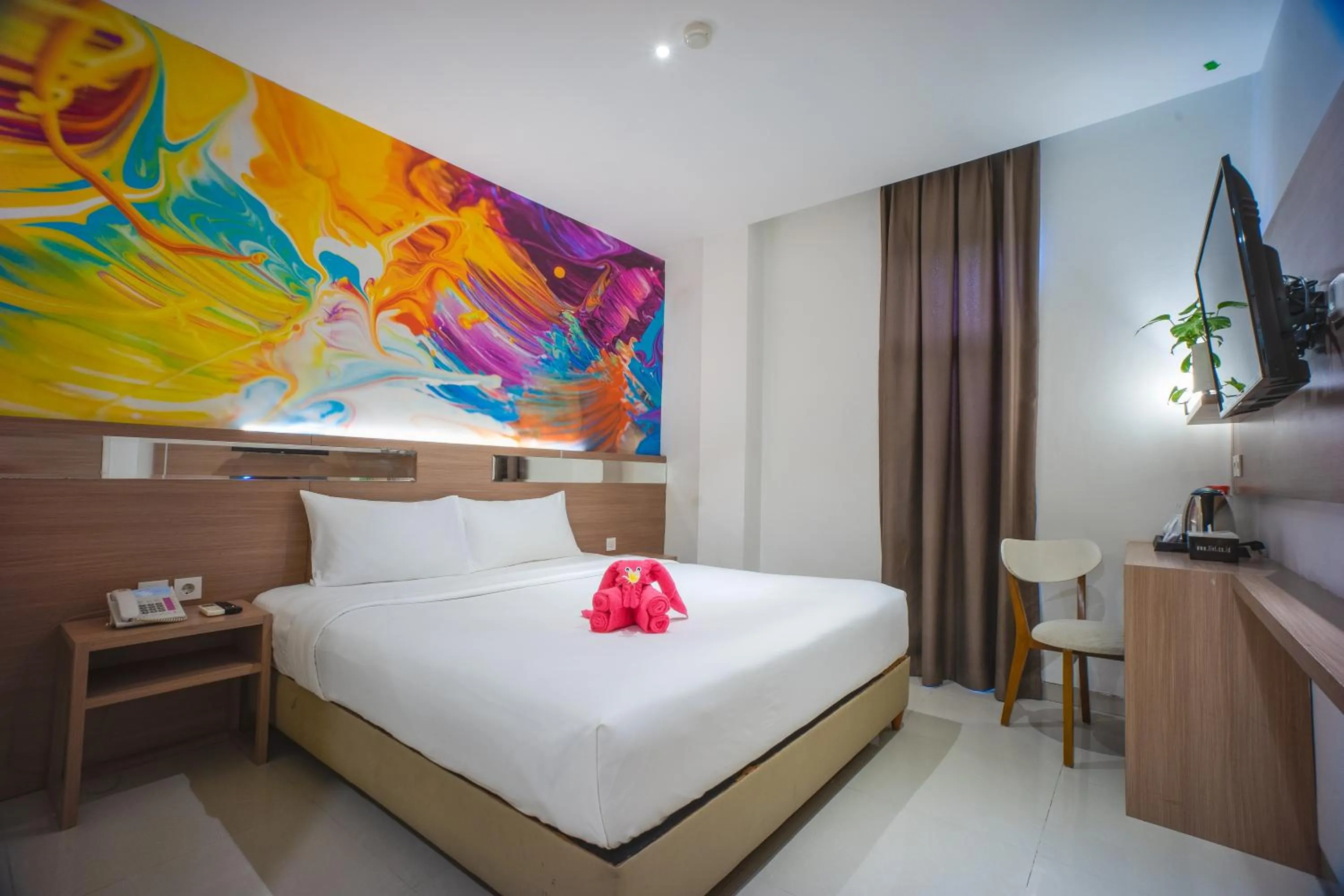 Bed in Triizz Hotel Semarang