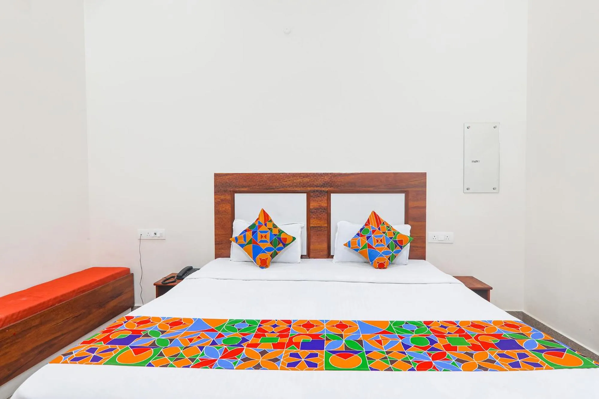 Bed in FabHotel Shree Venkatesh Nileyam