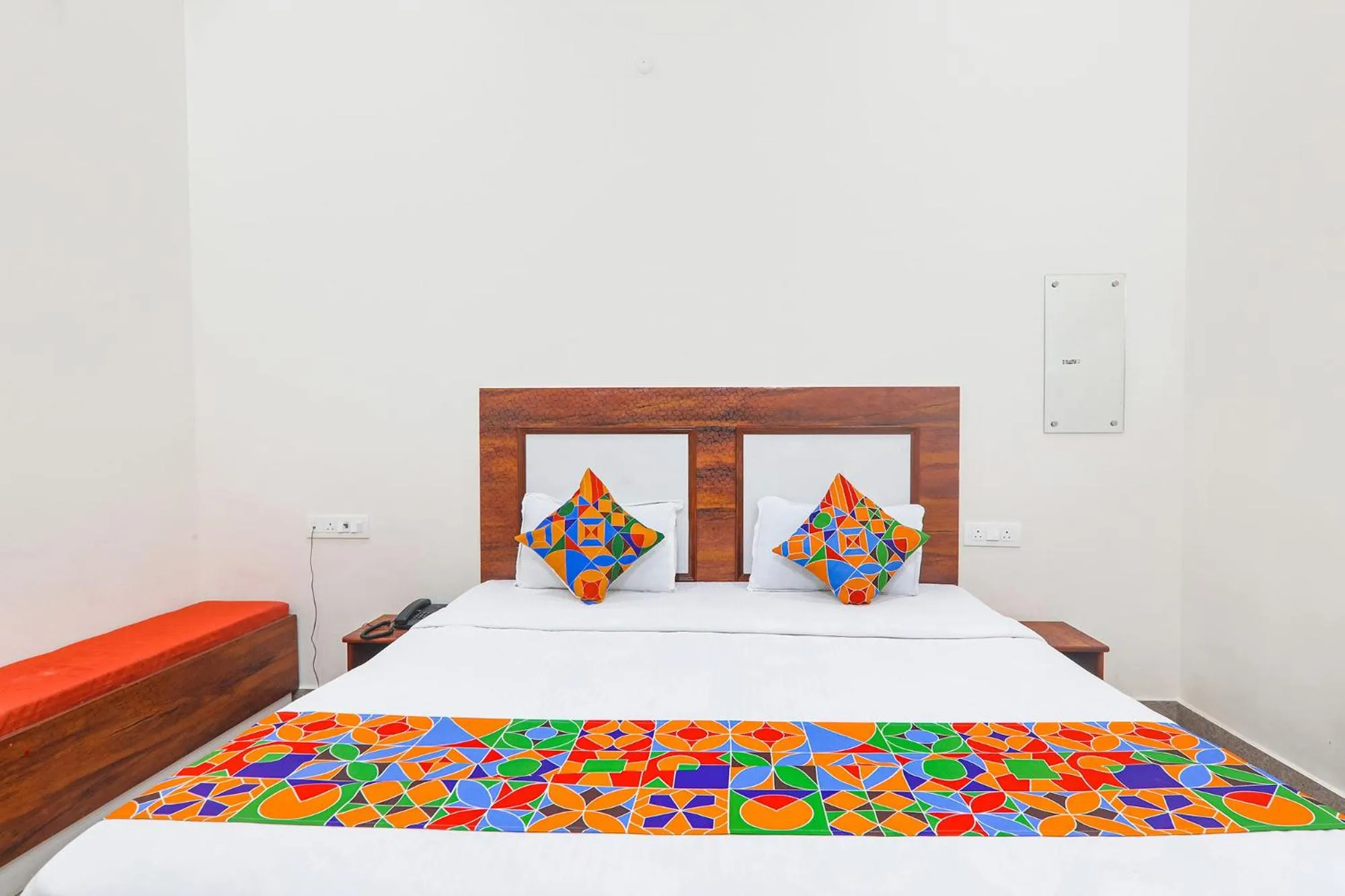 Bed in FabHotel Shree Venkatesh Nileyam