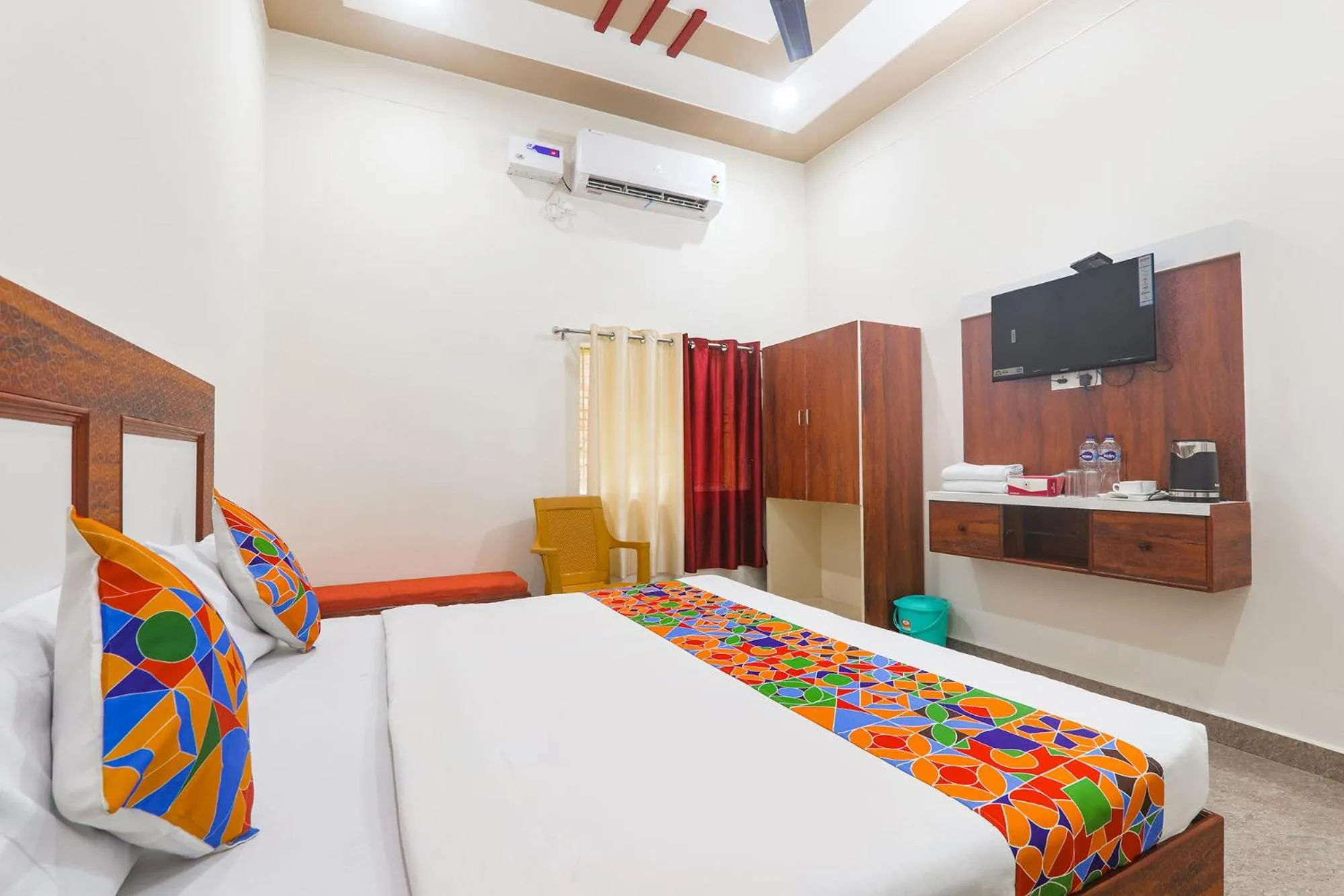 Bed in FabHotel Shree Venkatesh Nileyam