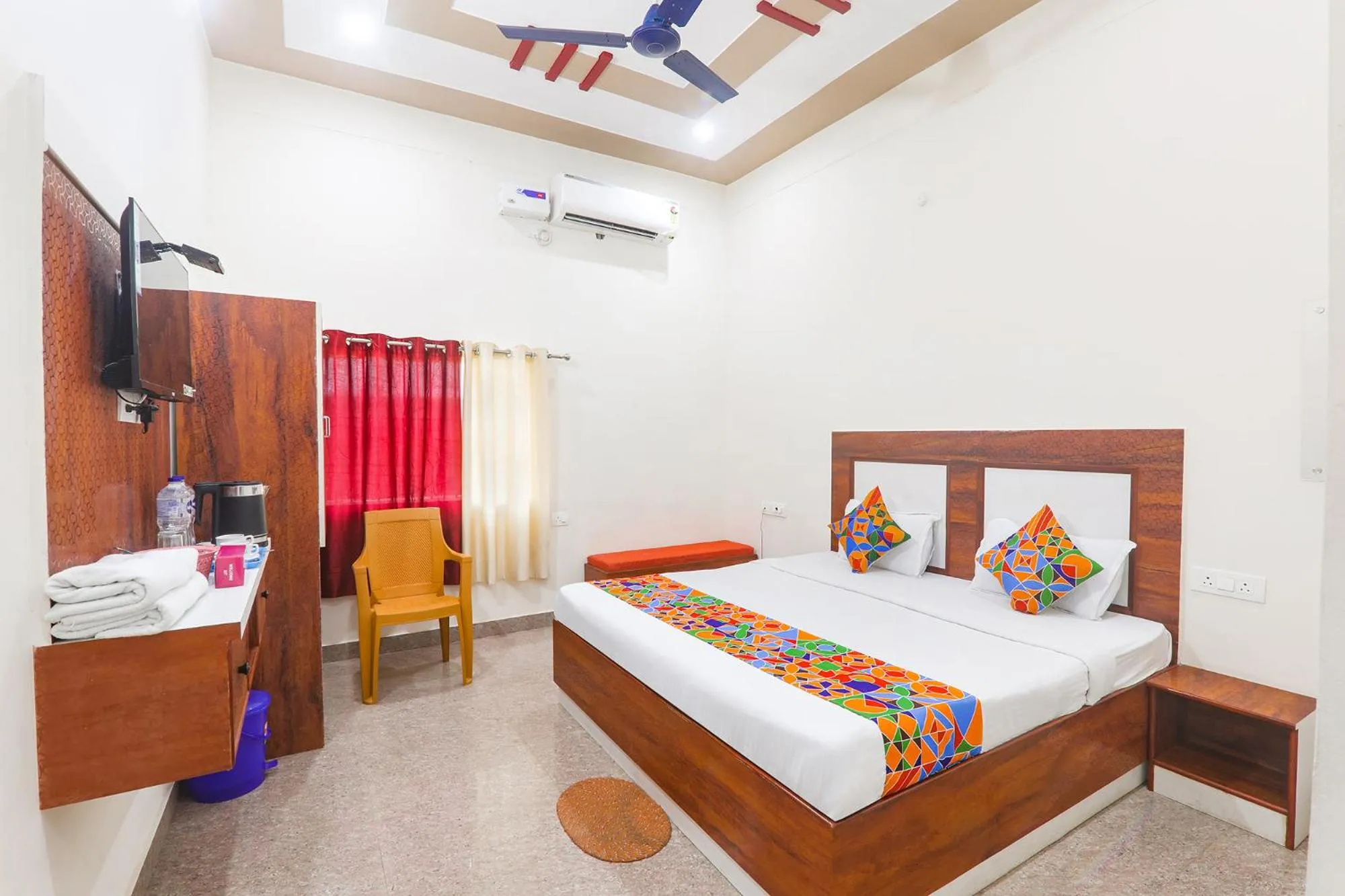 Bed in FabHotel Shree Venkatesh Nileyam