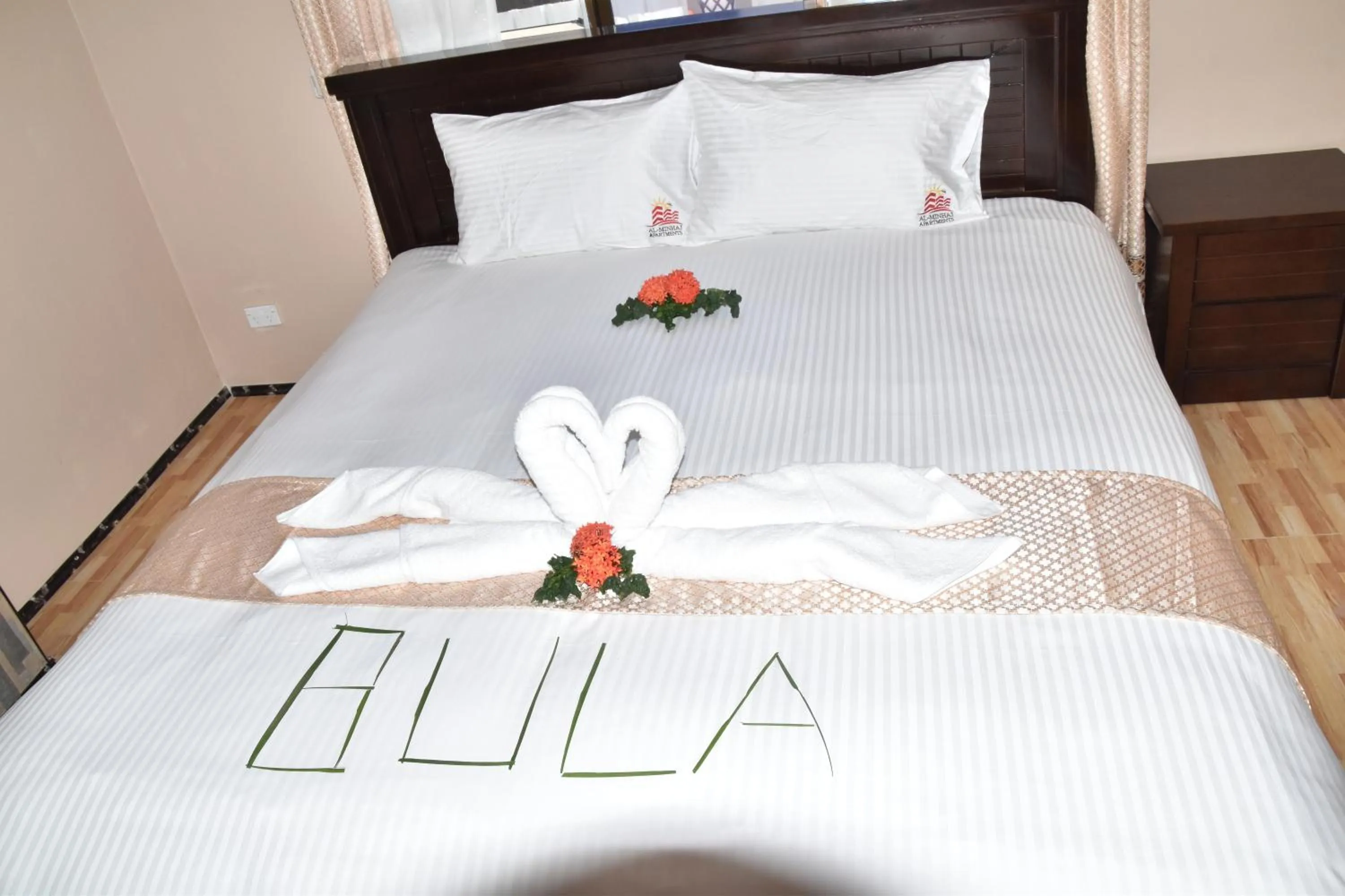 Bed in Al - Minhaj Service Apartments