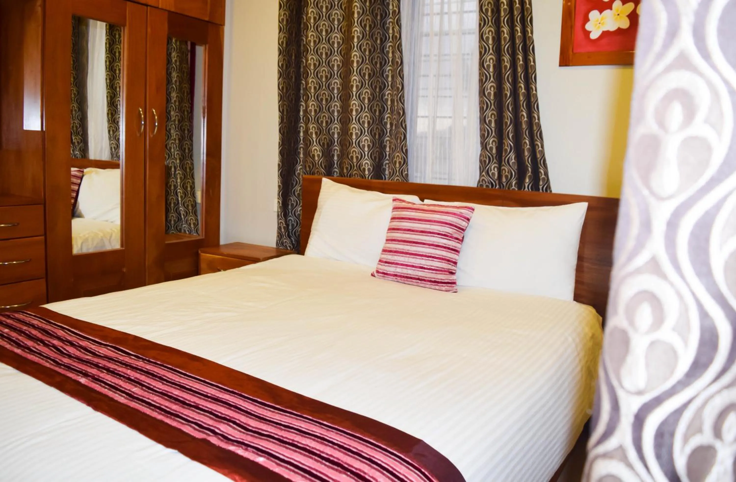 Bed in Al - Minhaj Service Apartments