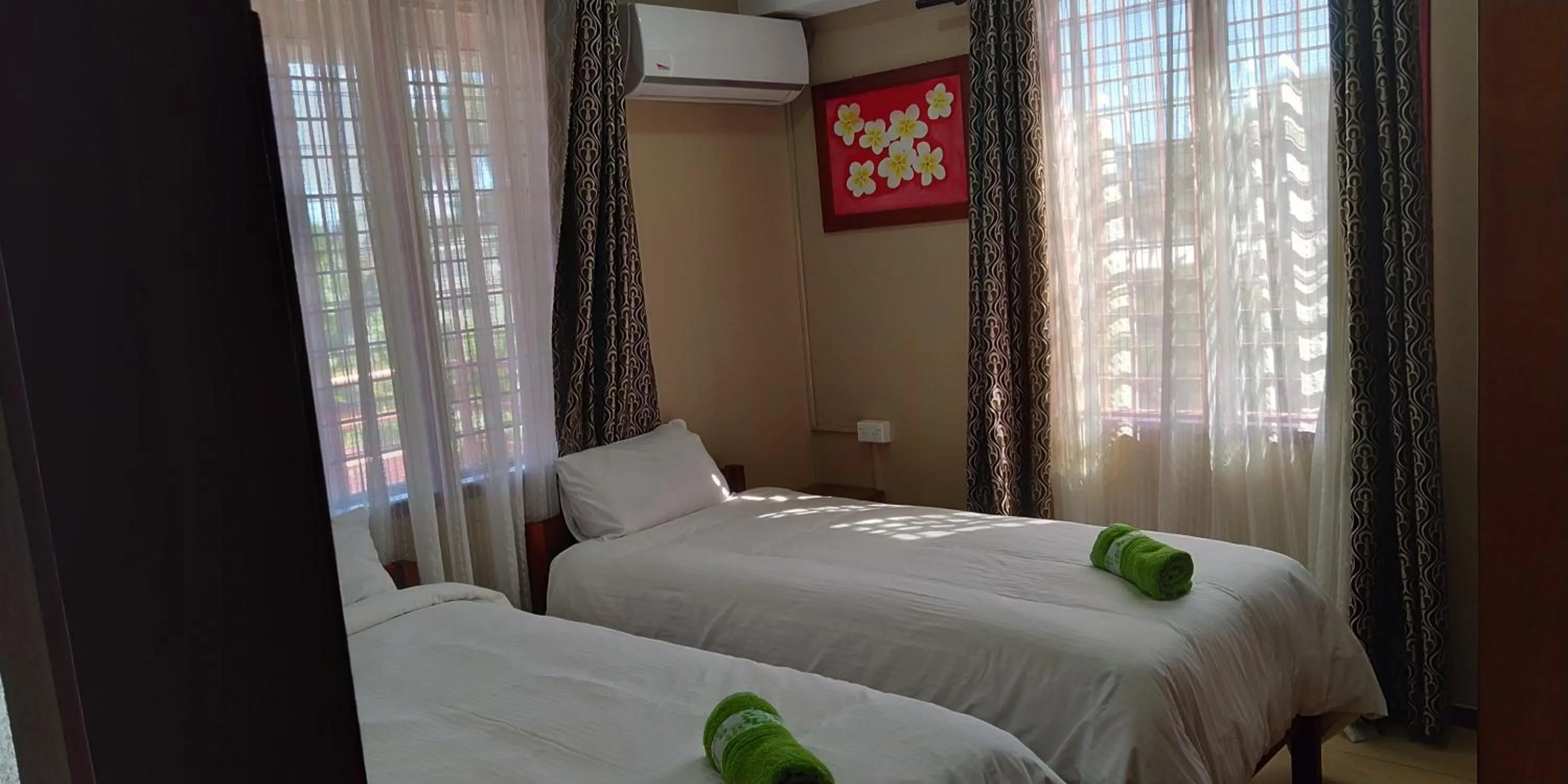 Bed in Al - Minhaj Service Apartments