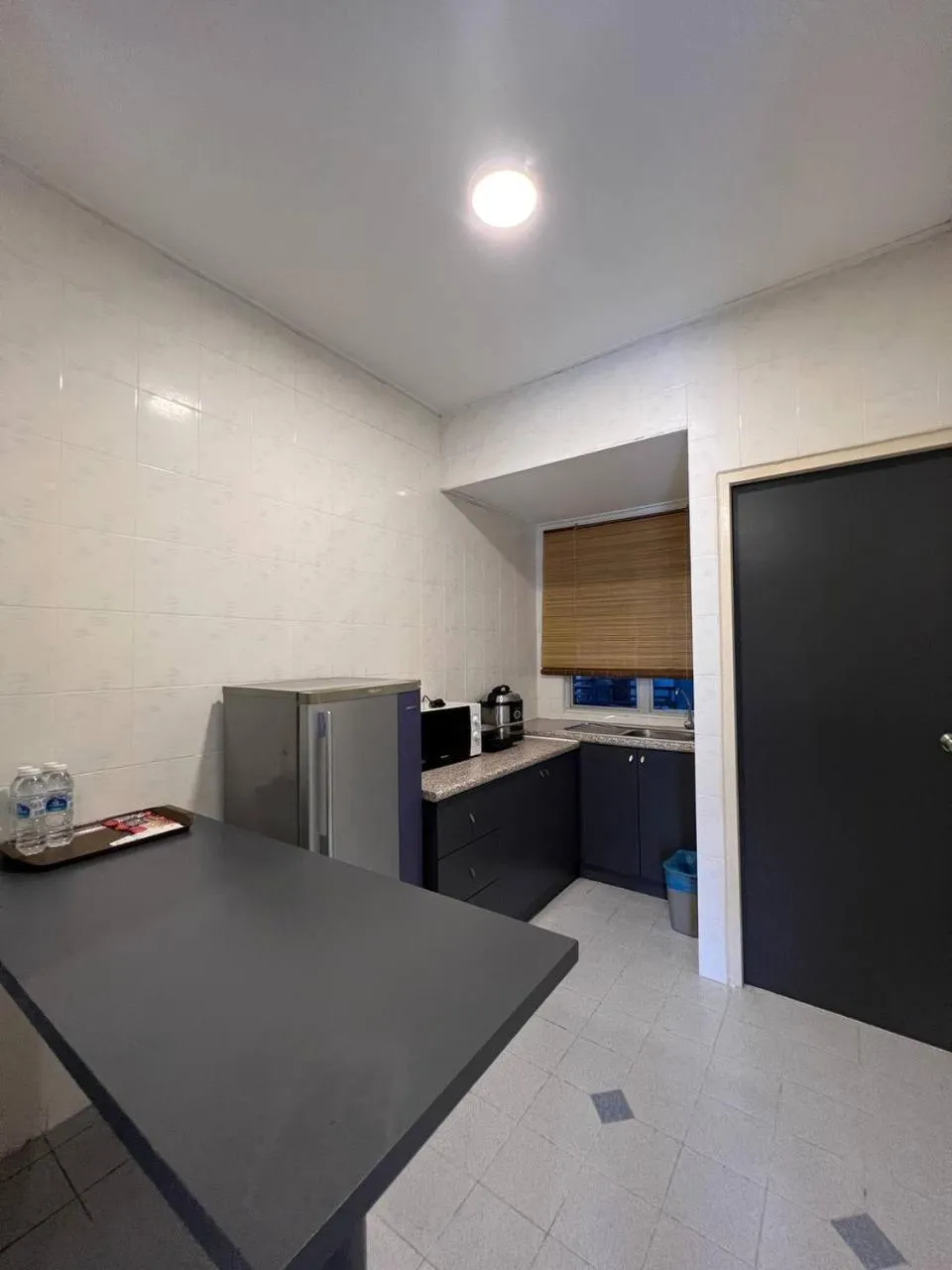 Kitchen or kitchenette in Perdana Serviced Apartment & Resorts