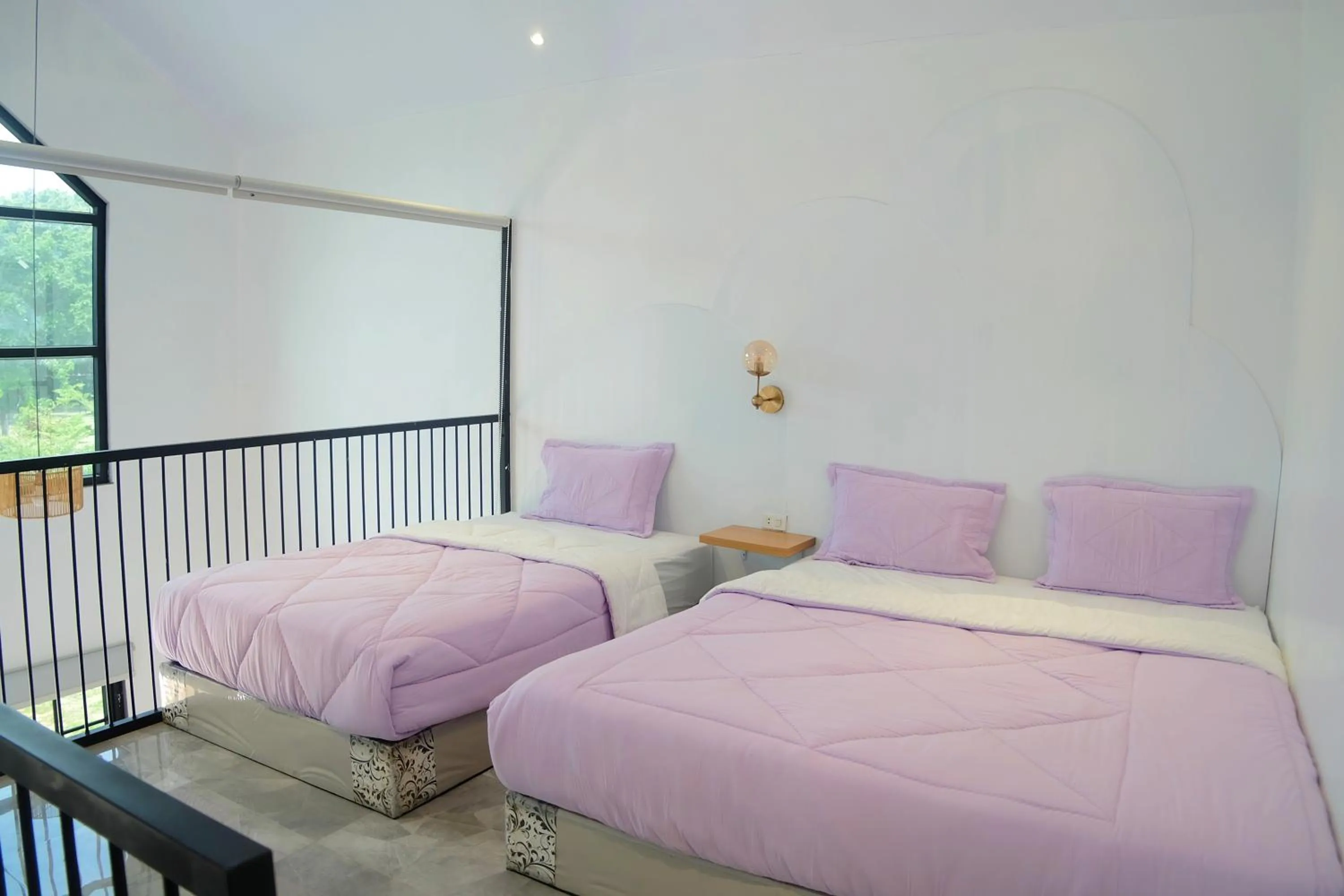 Bed in Sribudaya Resort