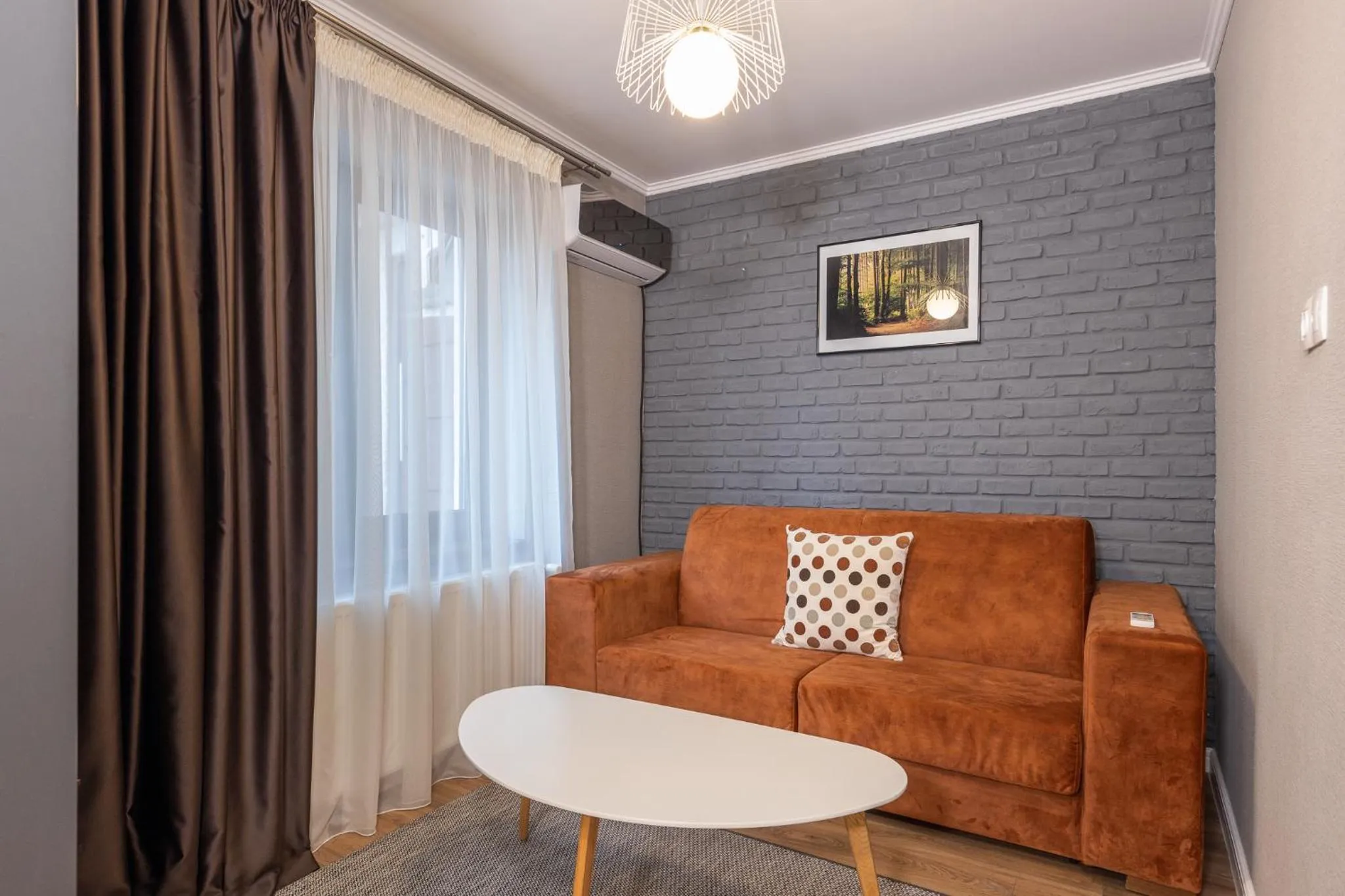 Living room in UpperHouse Suites & More