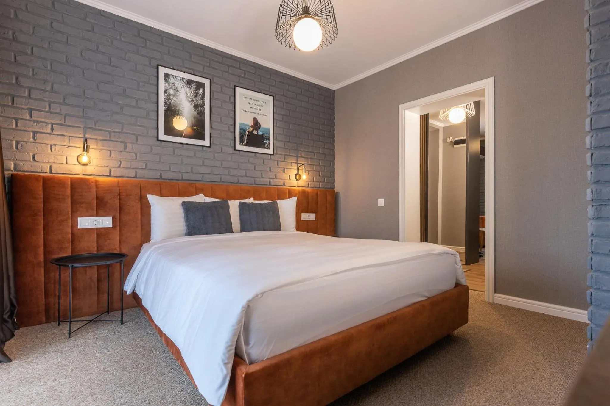 Bed in UpperHouse Suites & More