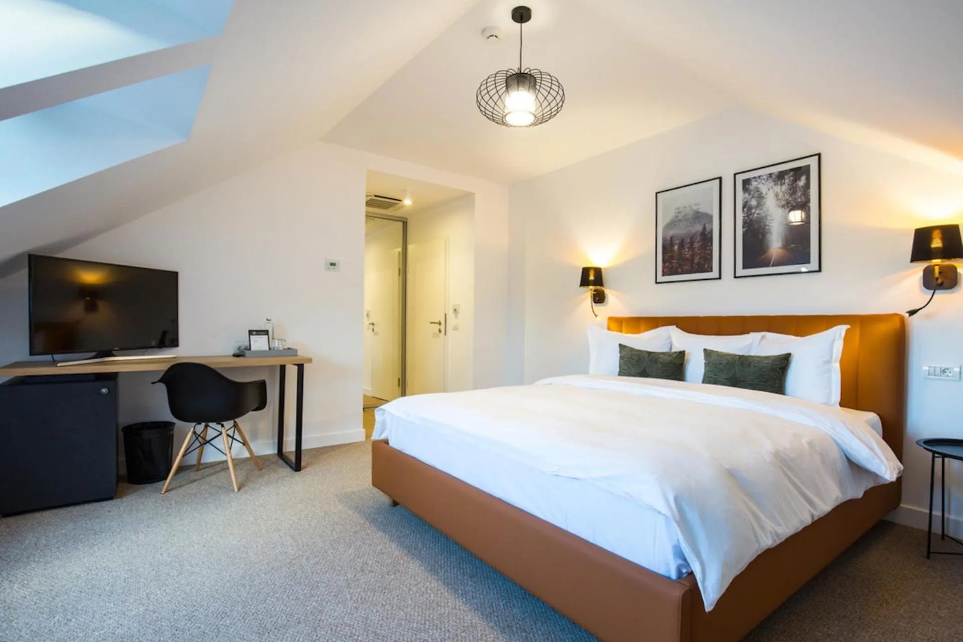 Bed in UpperHouse Suites & More