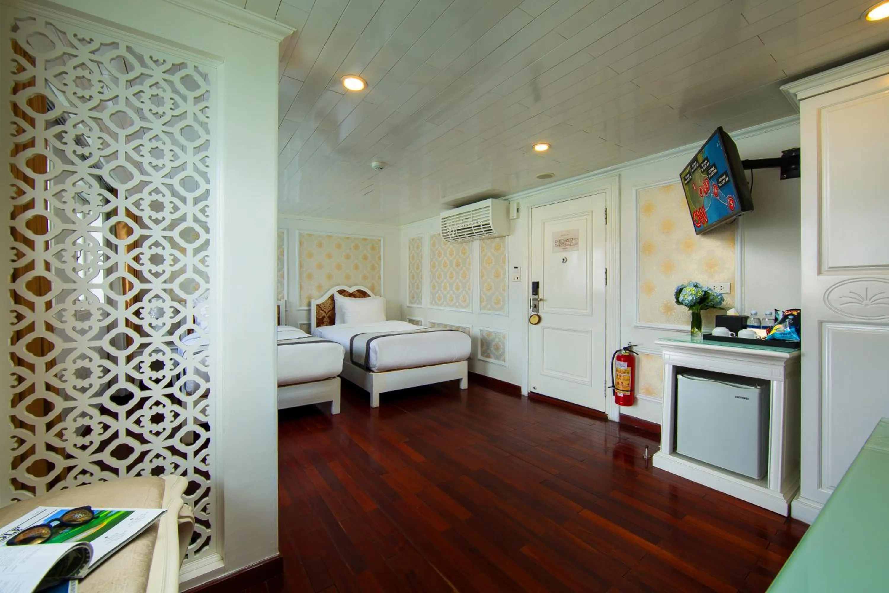 Living room, Bed in Signature Royal Halong Cruise
